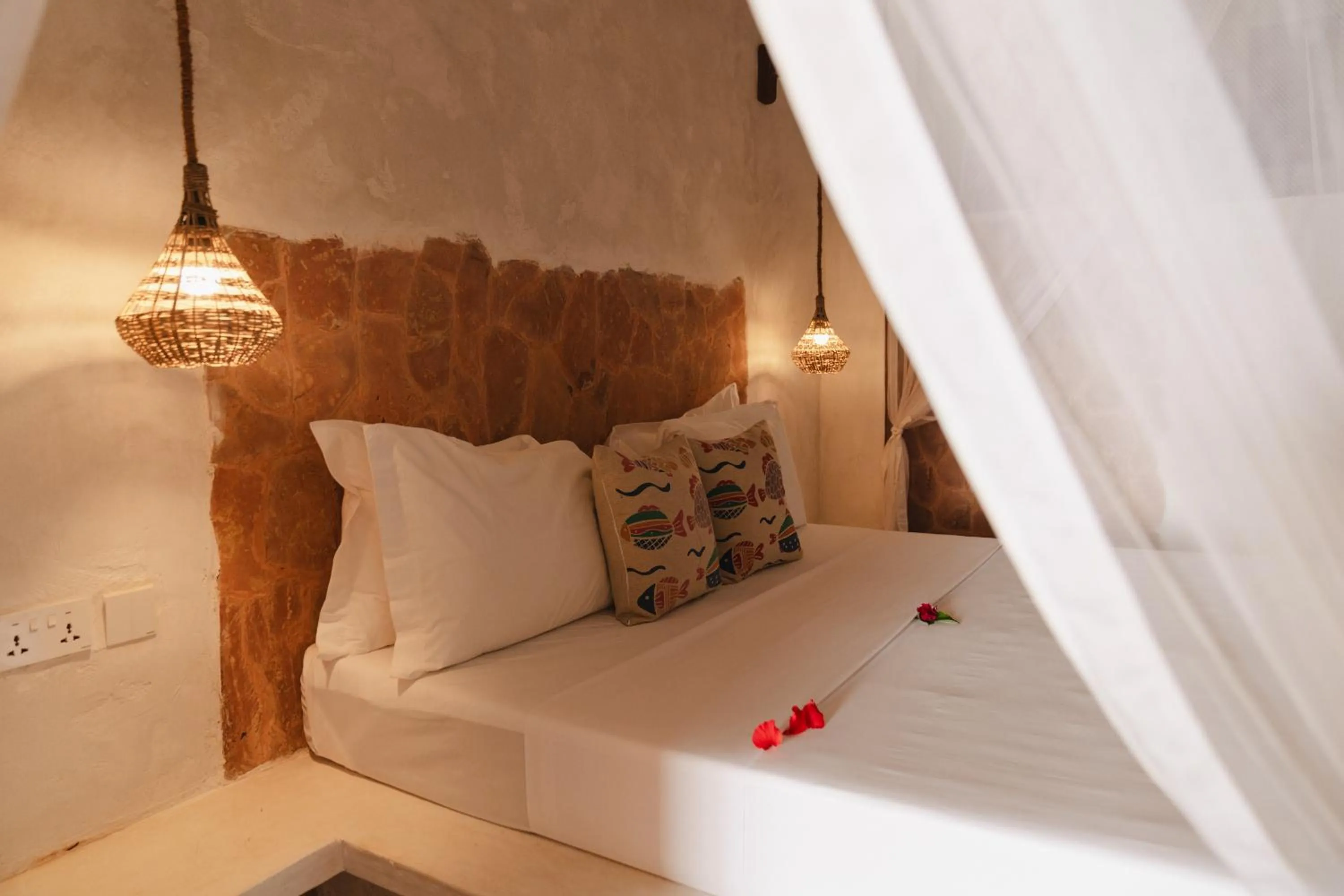 Bed in Mvuvi Boutique Resort