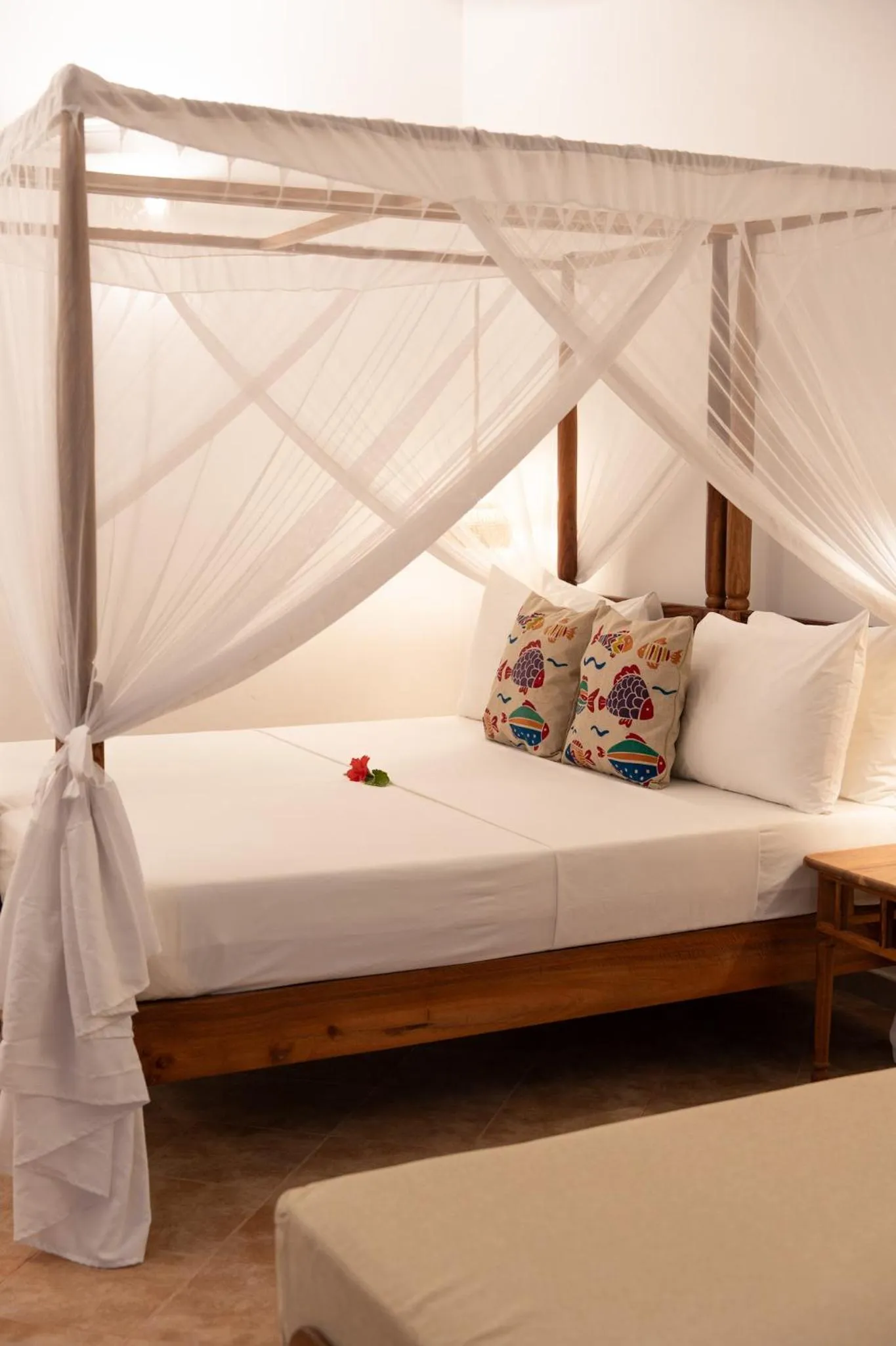 Bed in Mvuvi Boutique Resort
