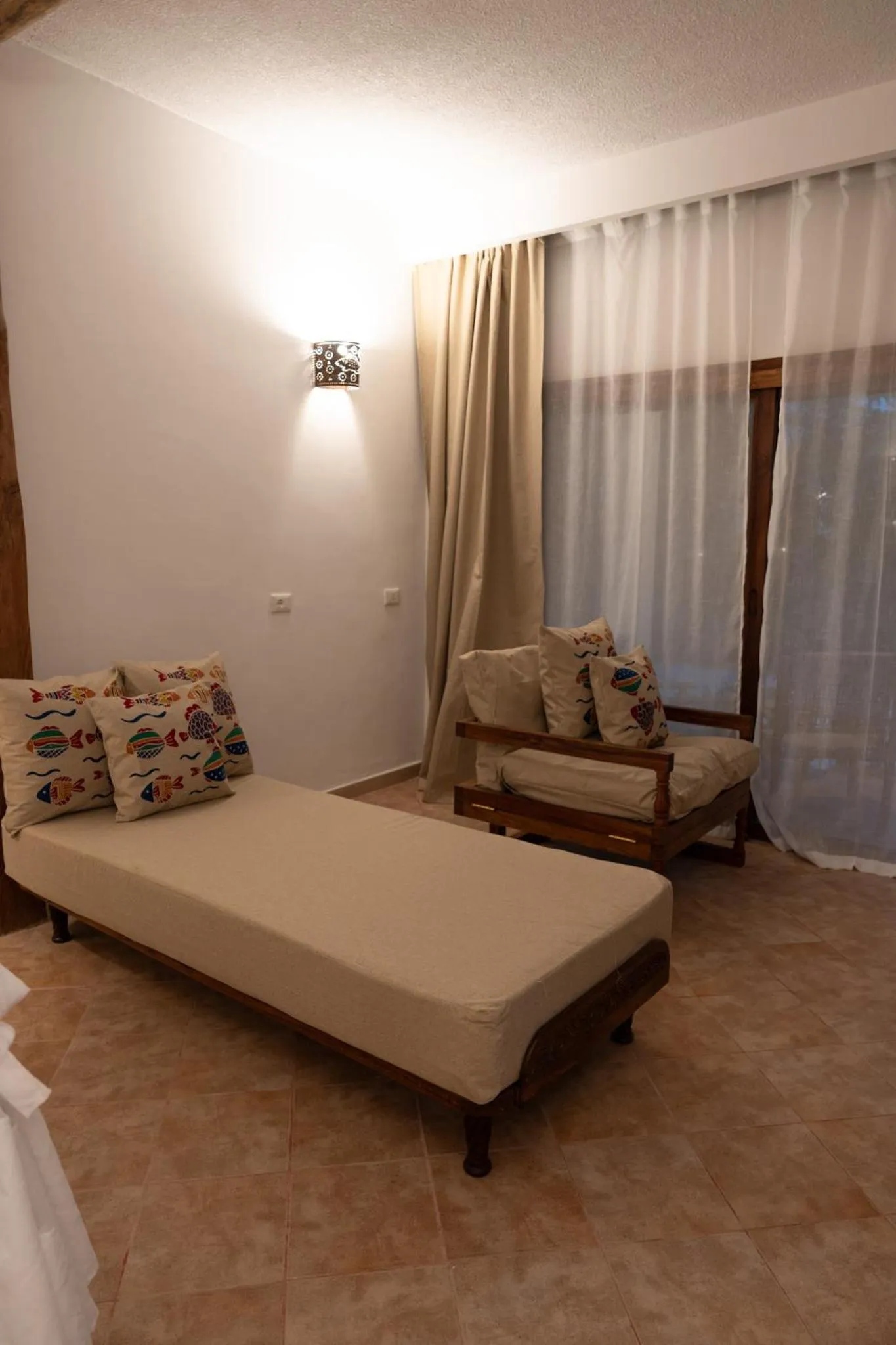 Bed in Mvuvi Boutique Resort