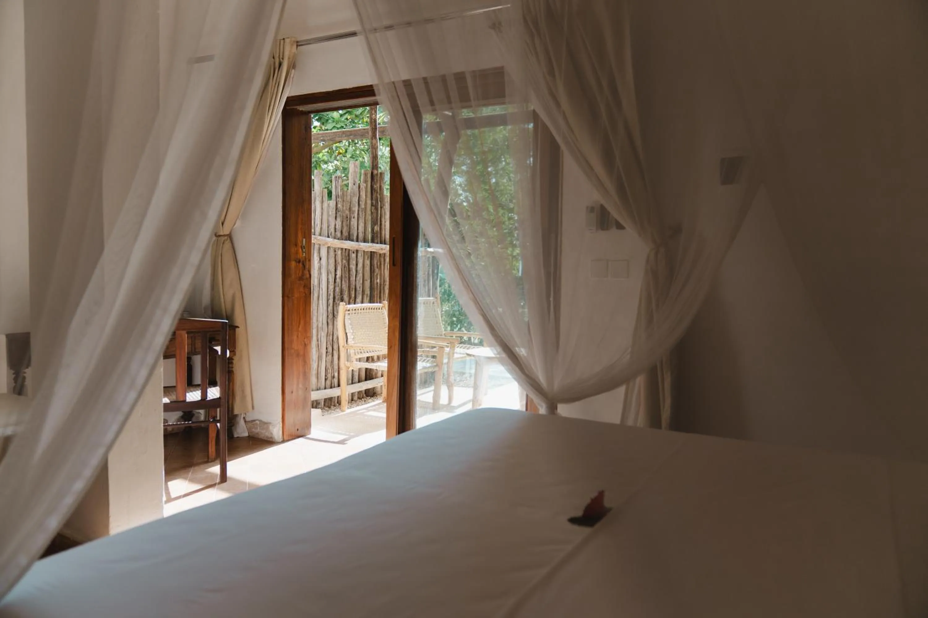 Photo of the whole room, Bed in Mvuvi Boutique Resort