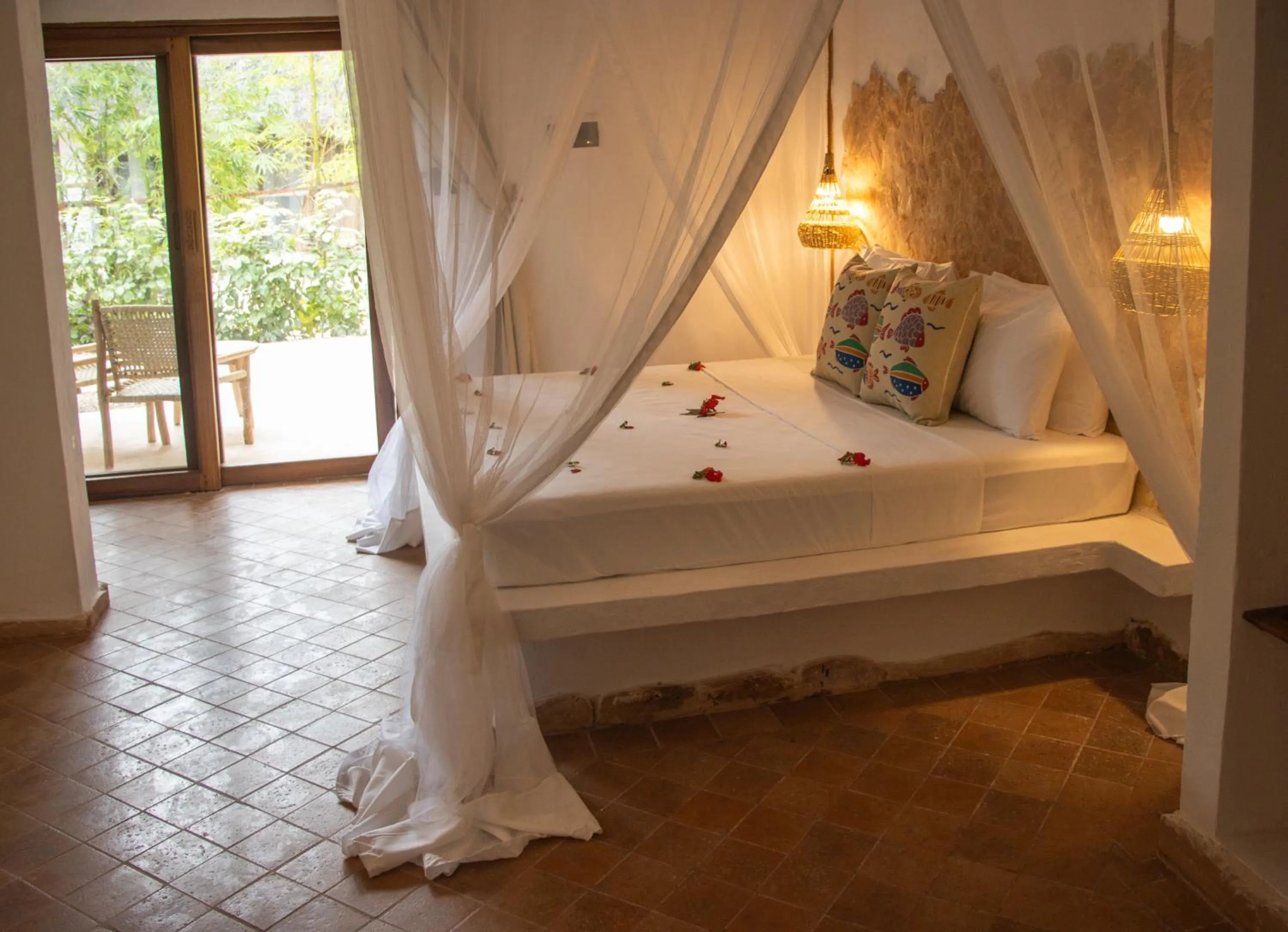 Bed in Mvuvi Boutique Resort