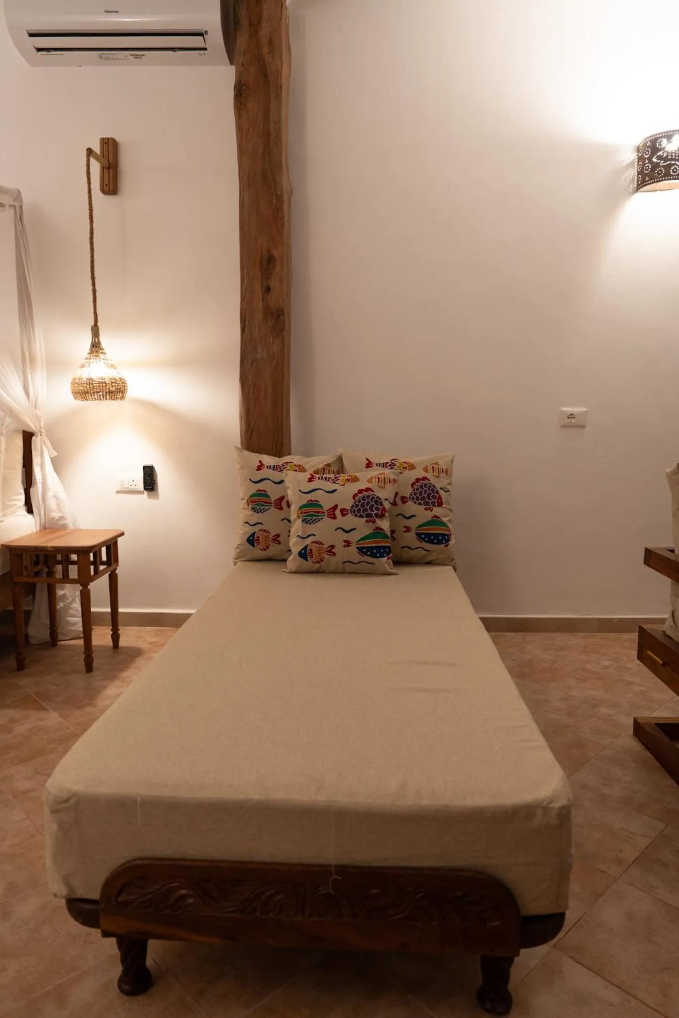 Bed in Mvuvi Boutique Resort