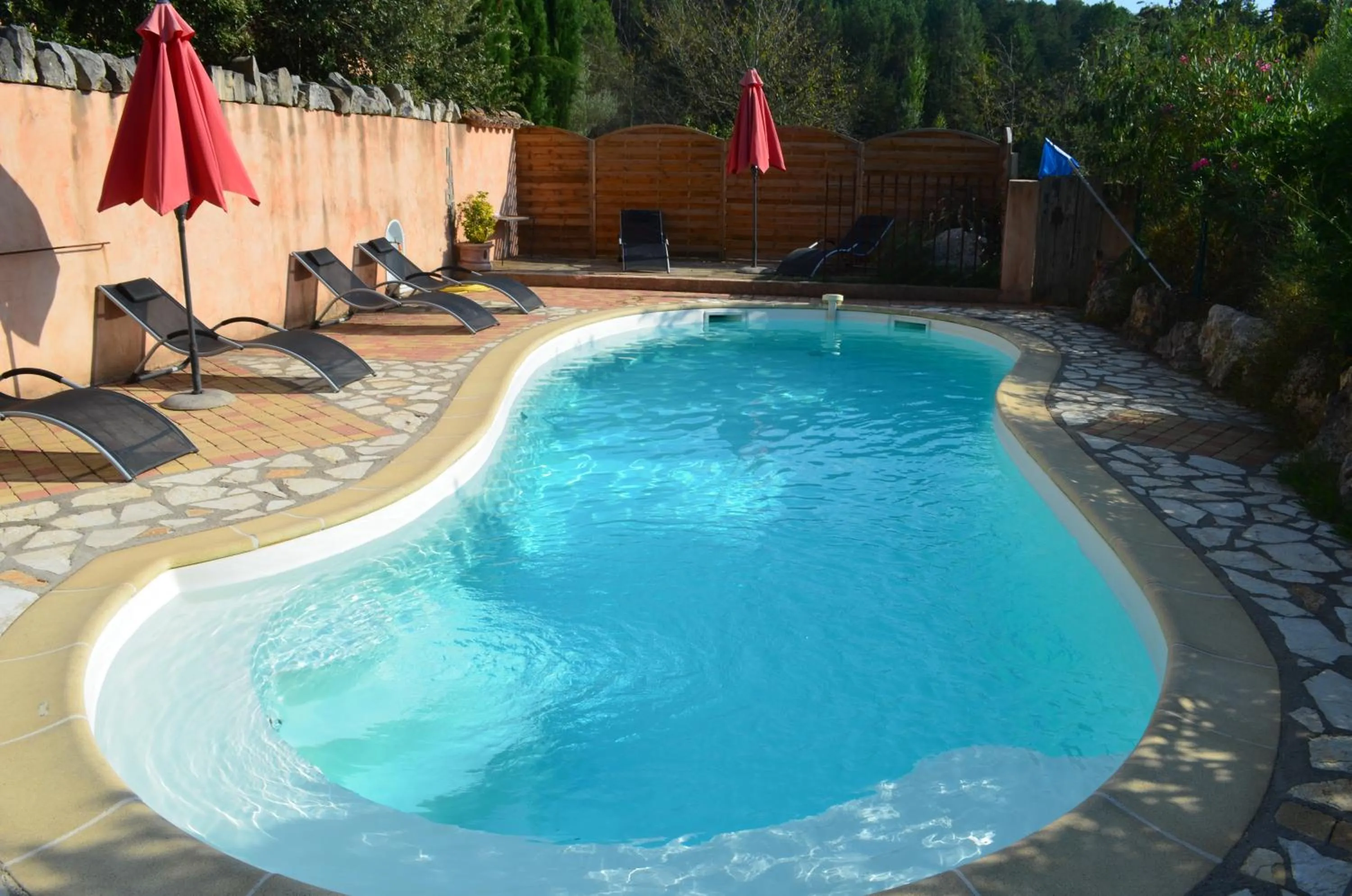 Swimming pool in Studios et Gite La Sauvasse
