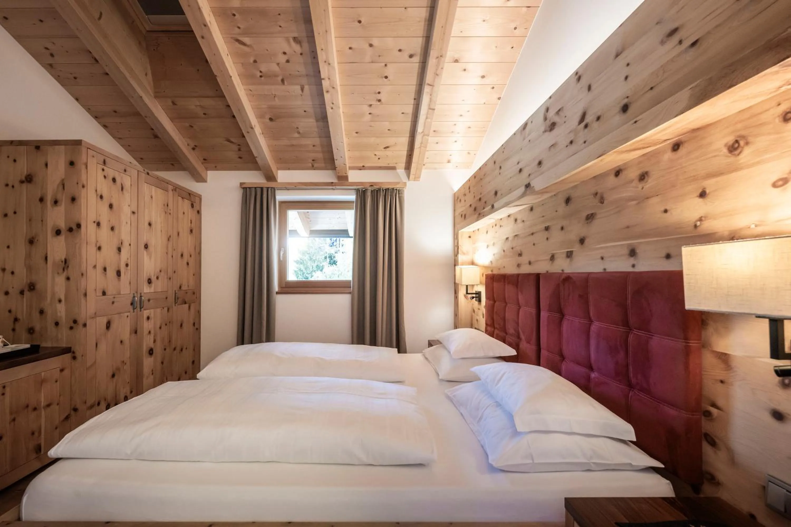 Photo of the whole room, Bed in Dolomites Nature Hotel Vigilerhof