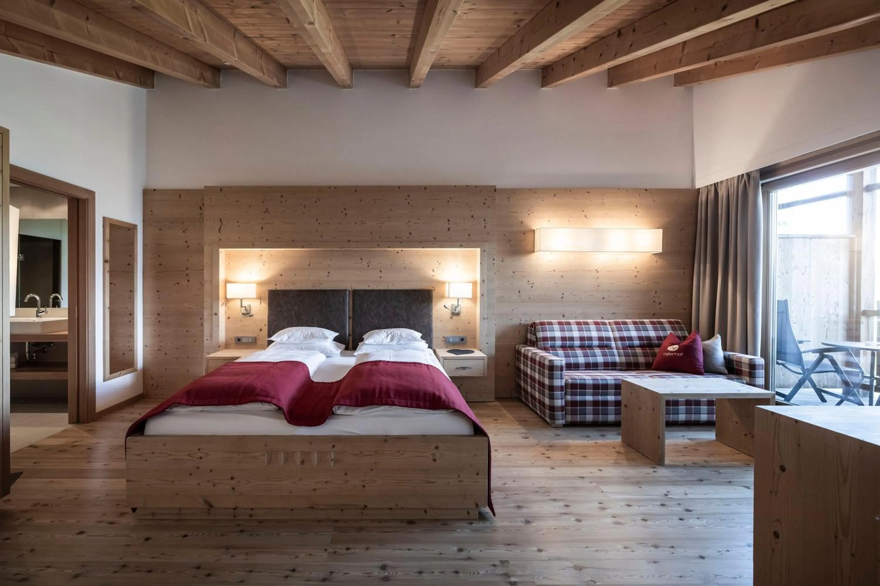 Photo of the whole room, Bed in Dolomites Nature Hotel Vigilerhof