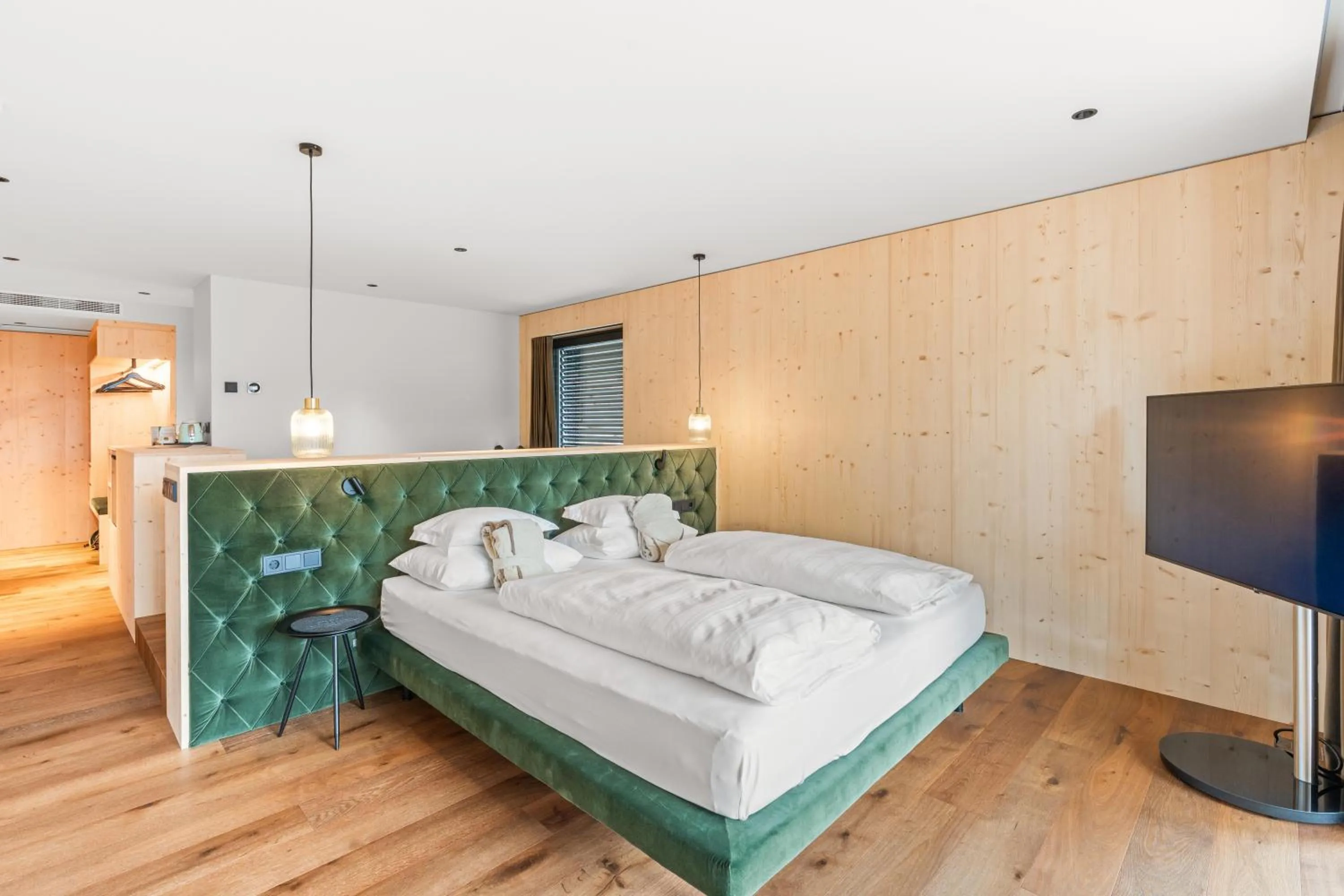 Photo of the whole room, Bed in Dolomites Nature Hotel Vigilerhof