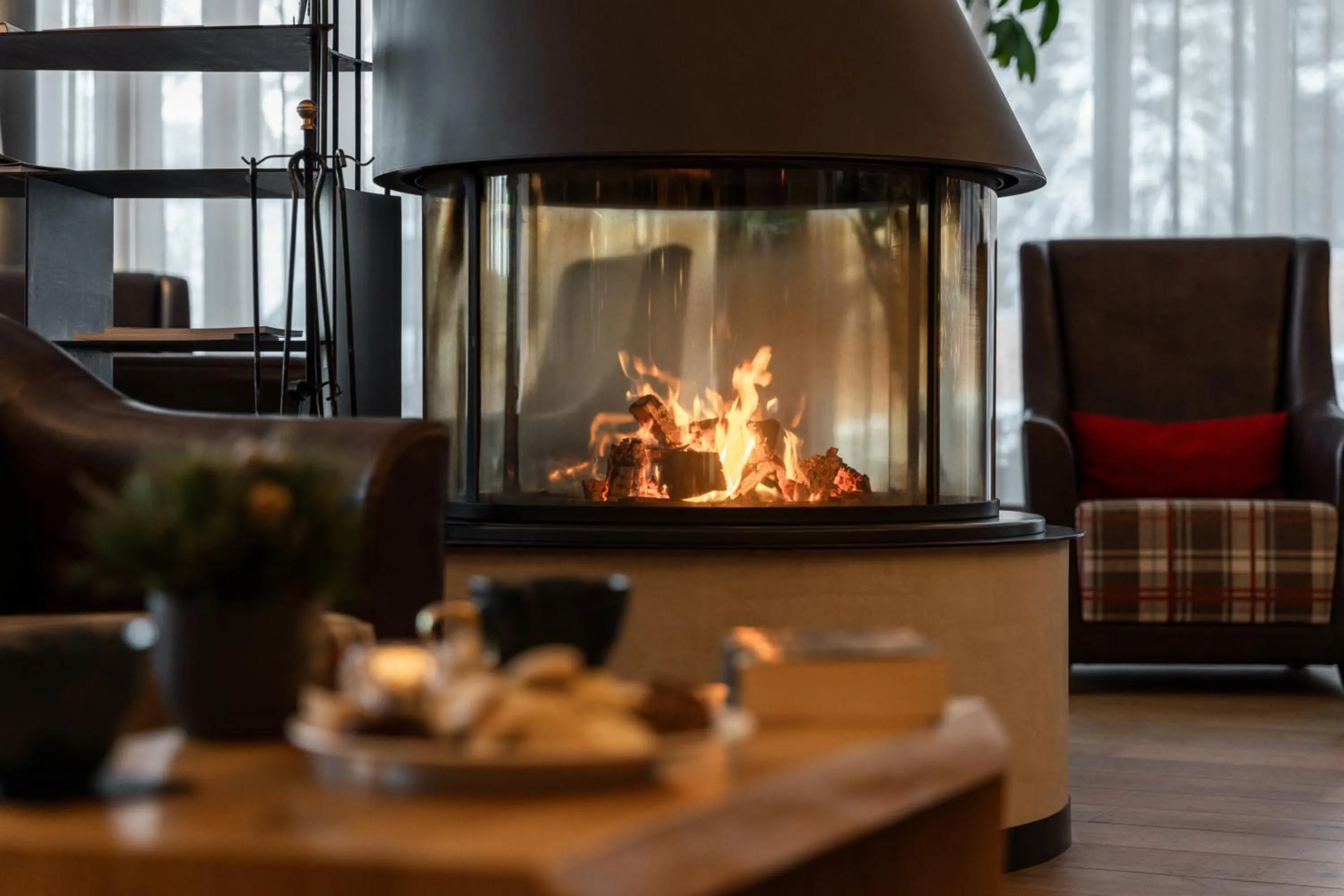 Communal lounge/ TV room in Dolomites Nature Hotel Vigilerhof