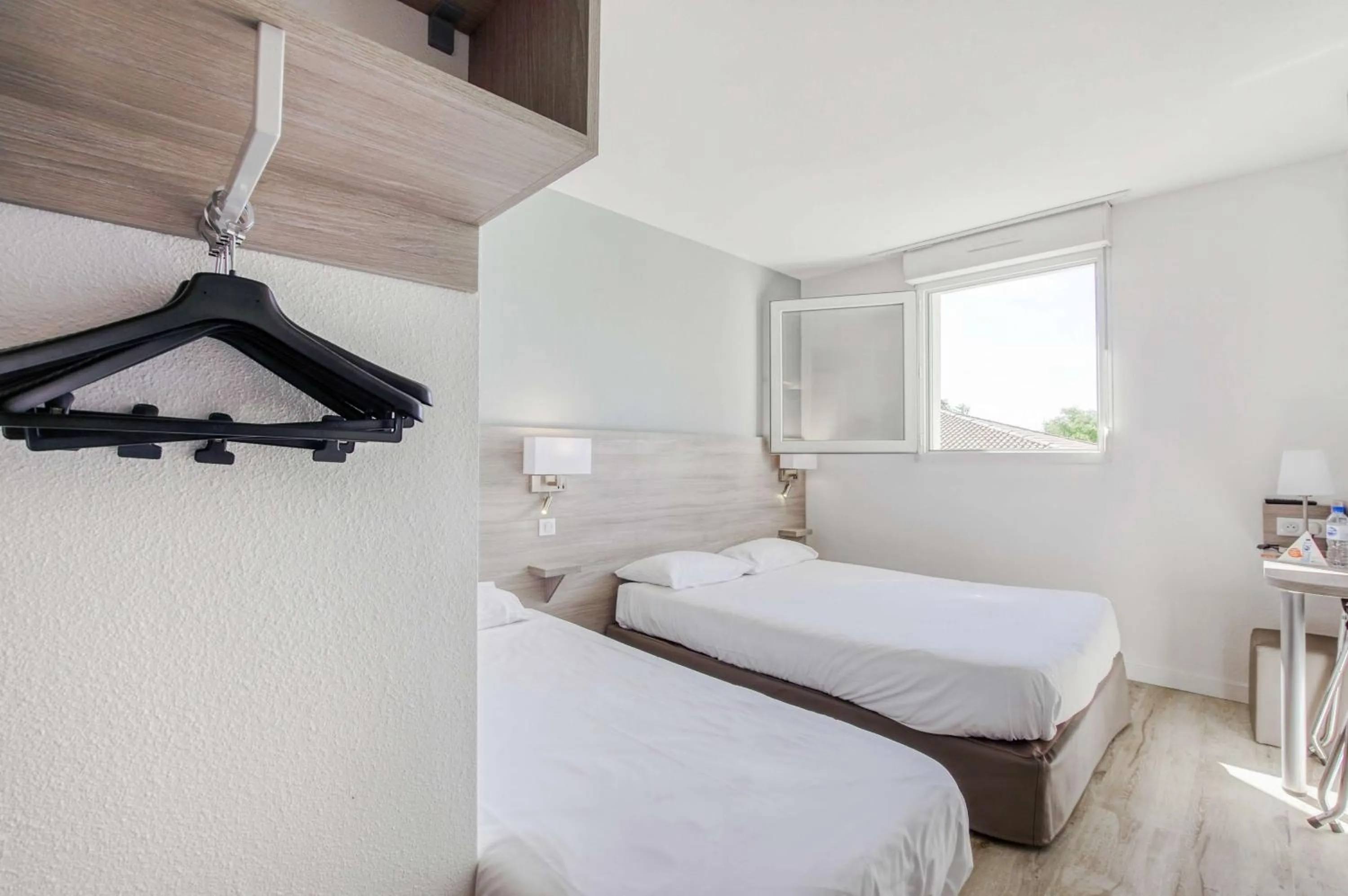 Bedroom, Bed in Brit Hotel Clermont-lʼHérault