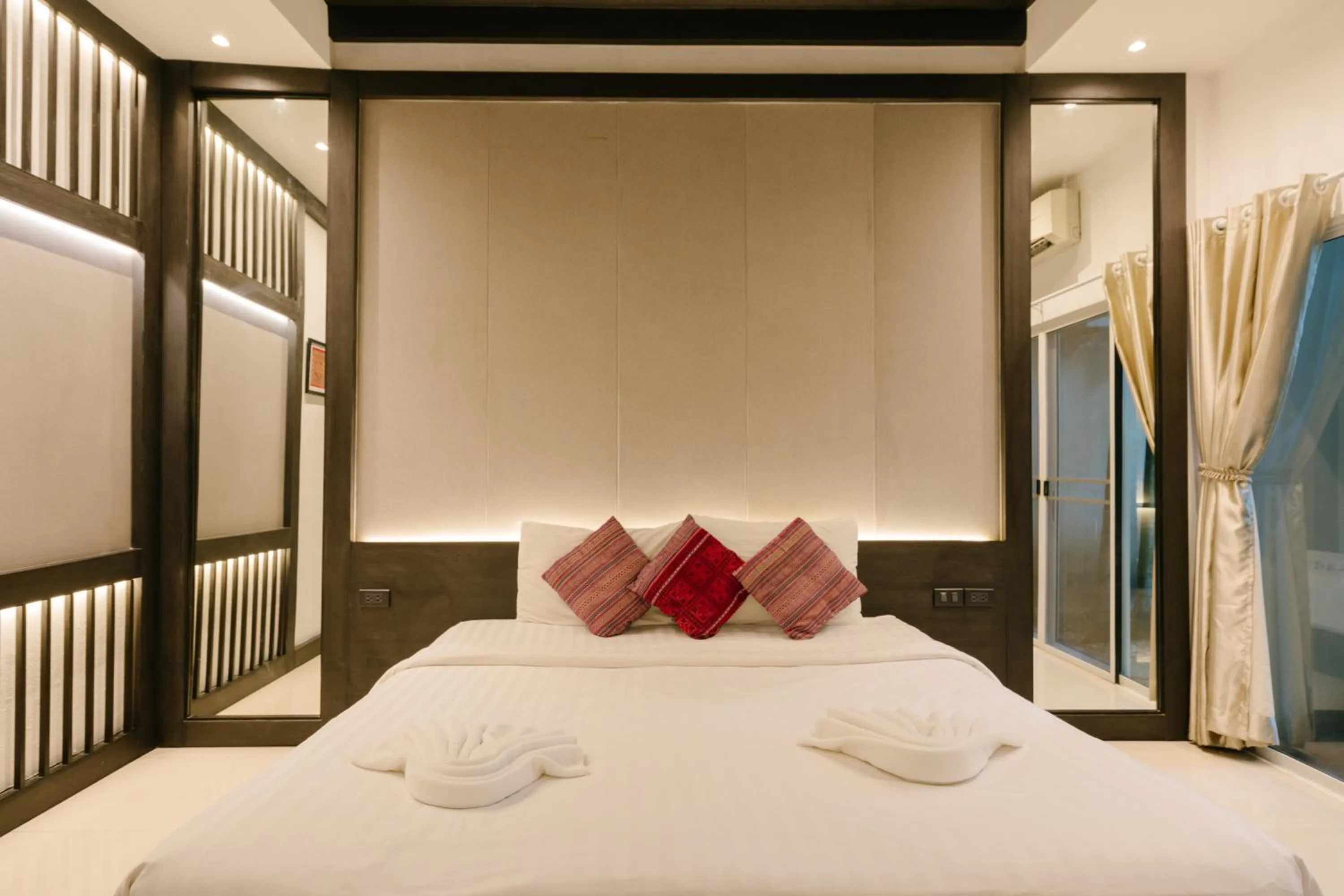 Bed in The Opium Chiang Mai