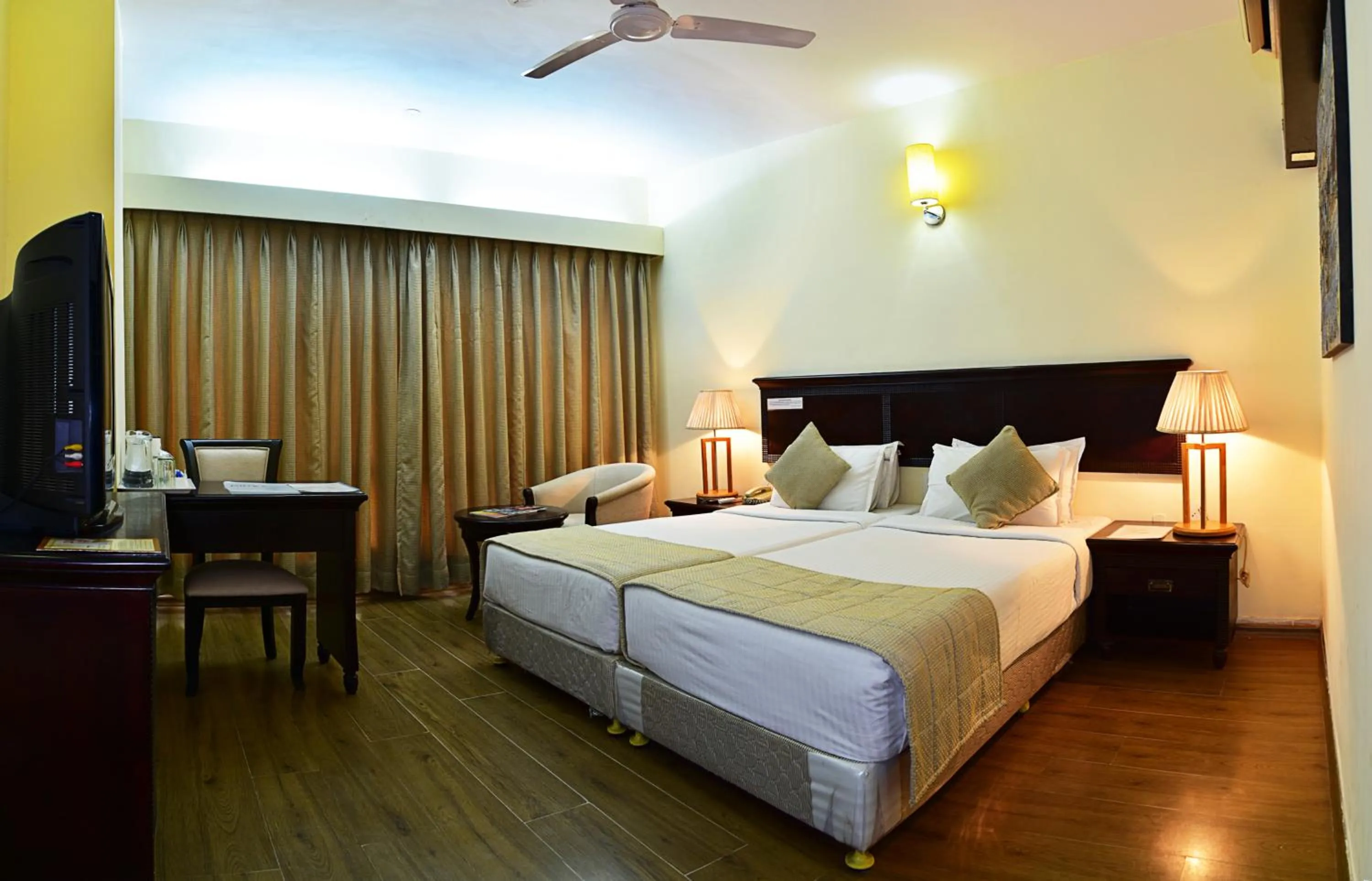 Bed in Inventree hotels & Resort