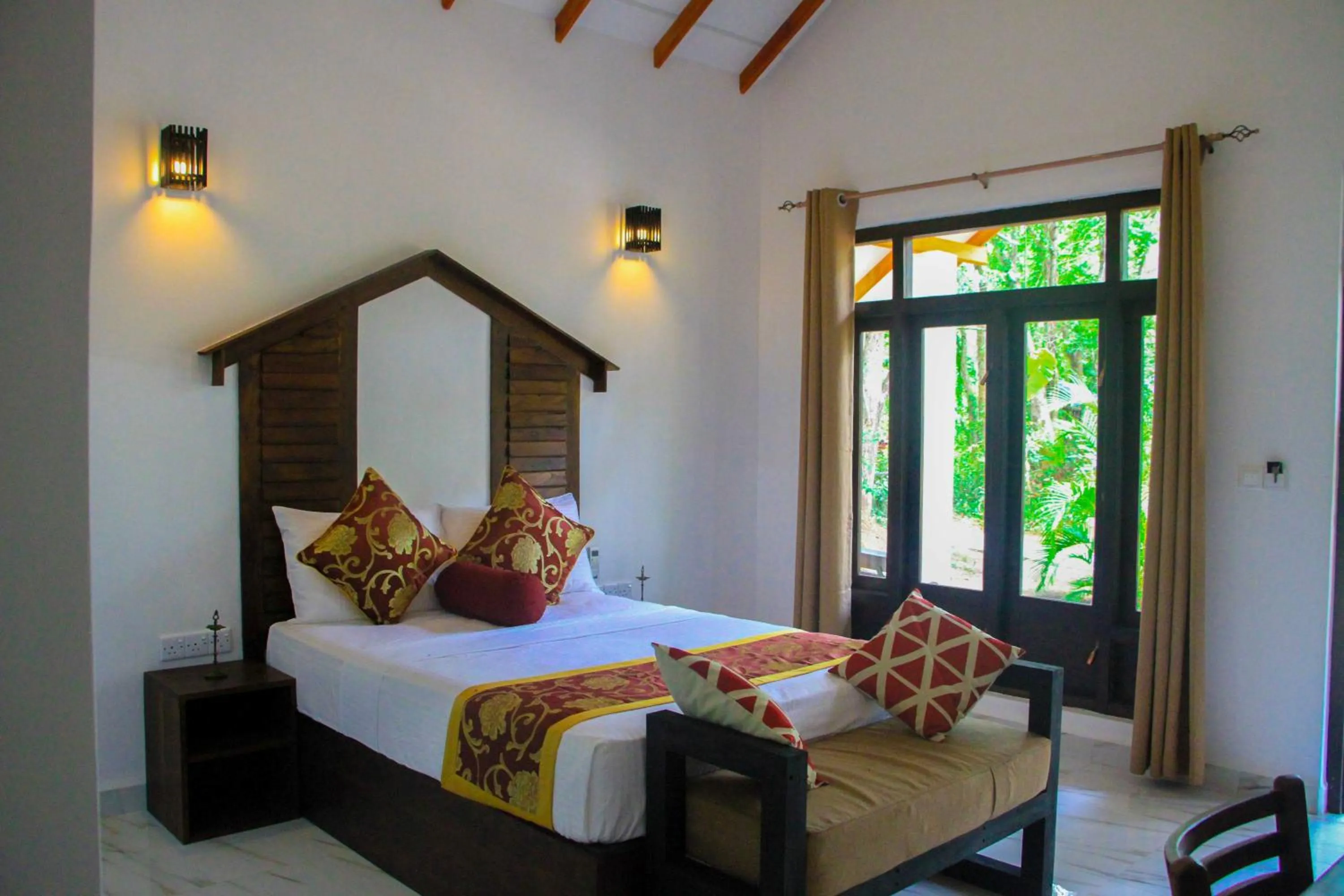 Bed in Palmyra Nature Resort Sigiriya