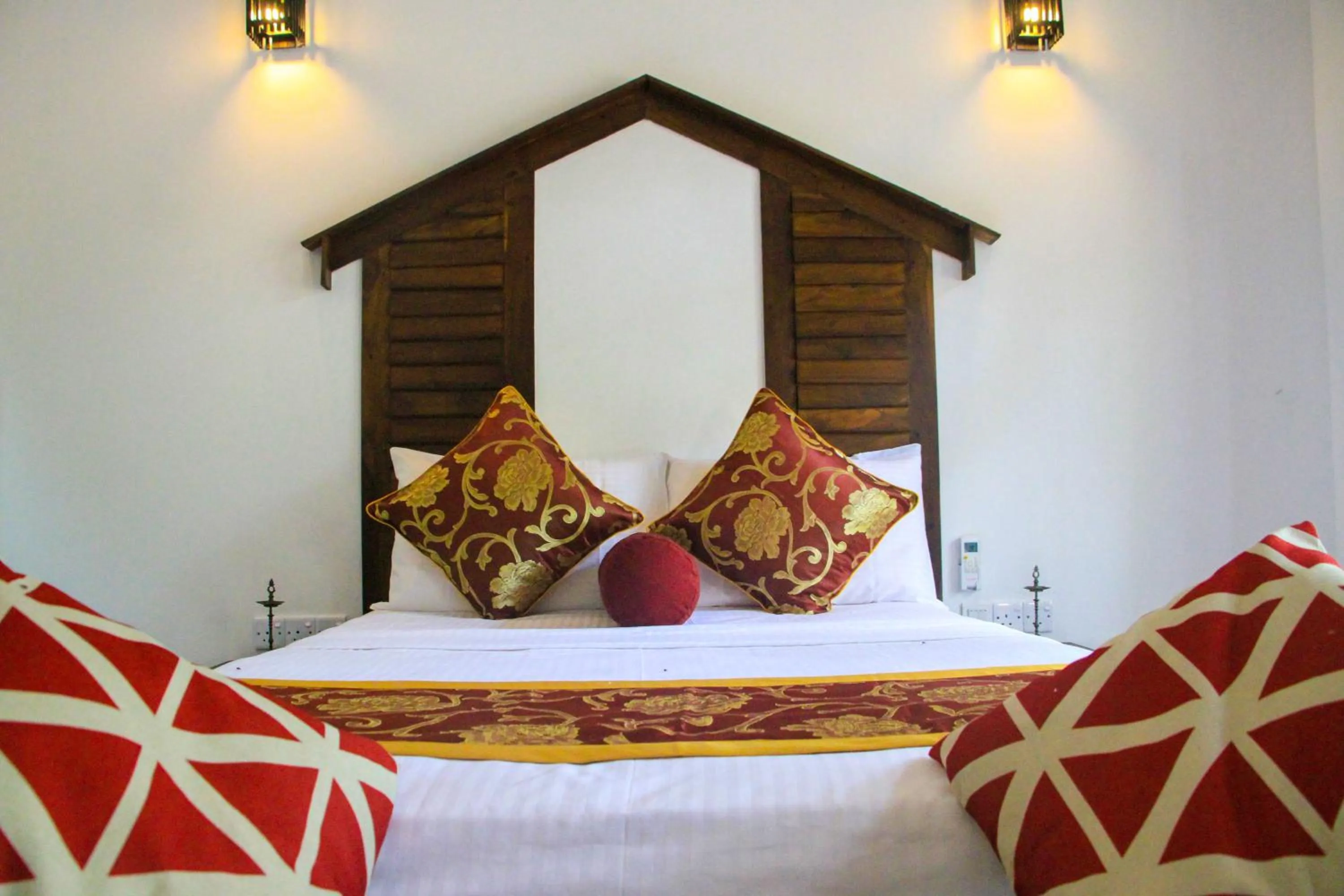 Bed in Palmyra Nature Resort Sigiriya
