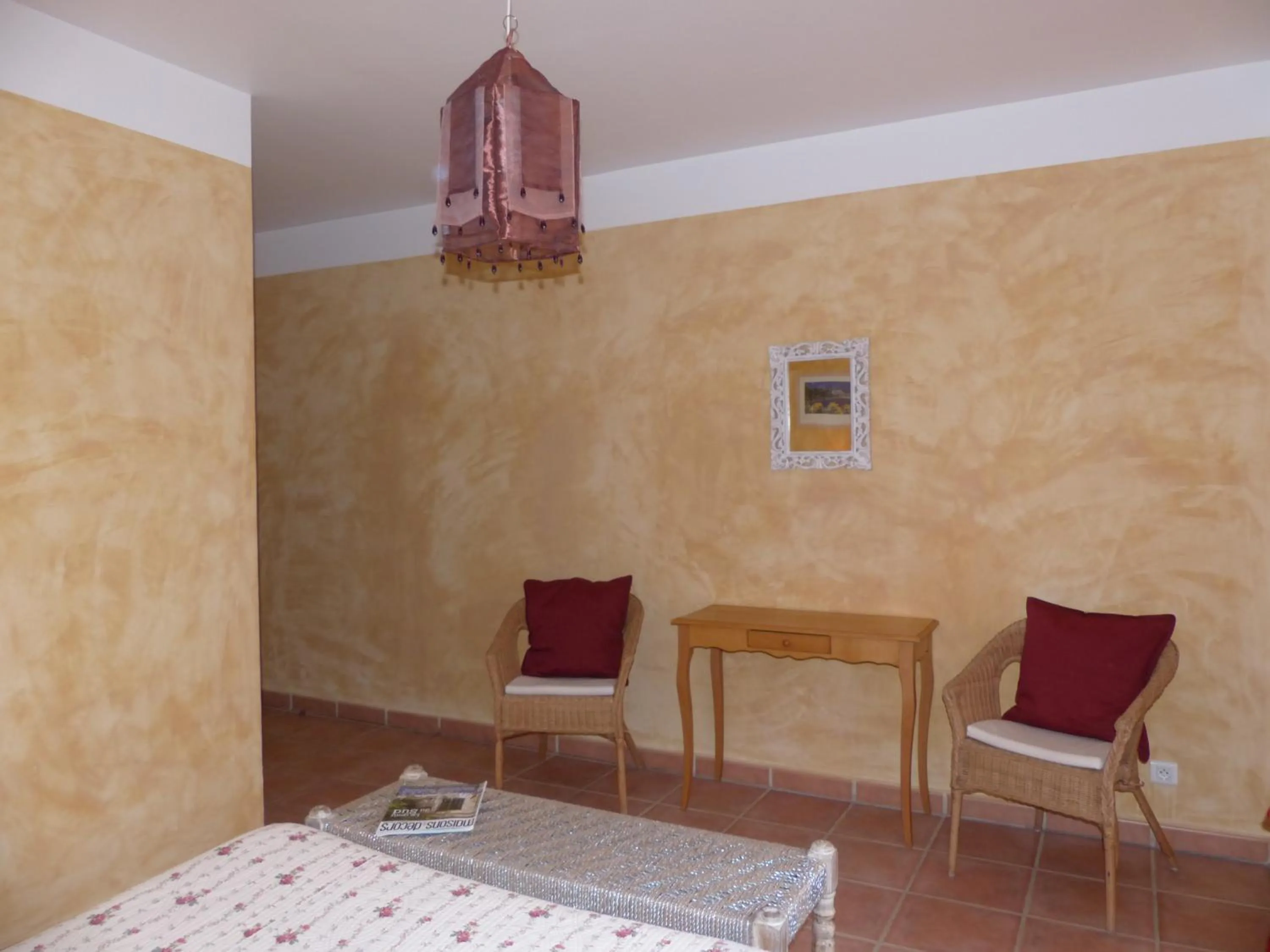 Bedroom in La Ferme du petit Ségriès Bed and Breakfast
