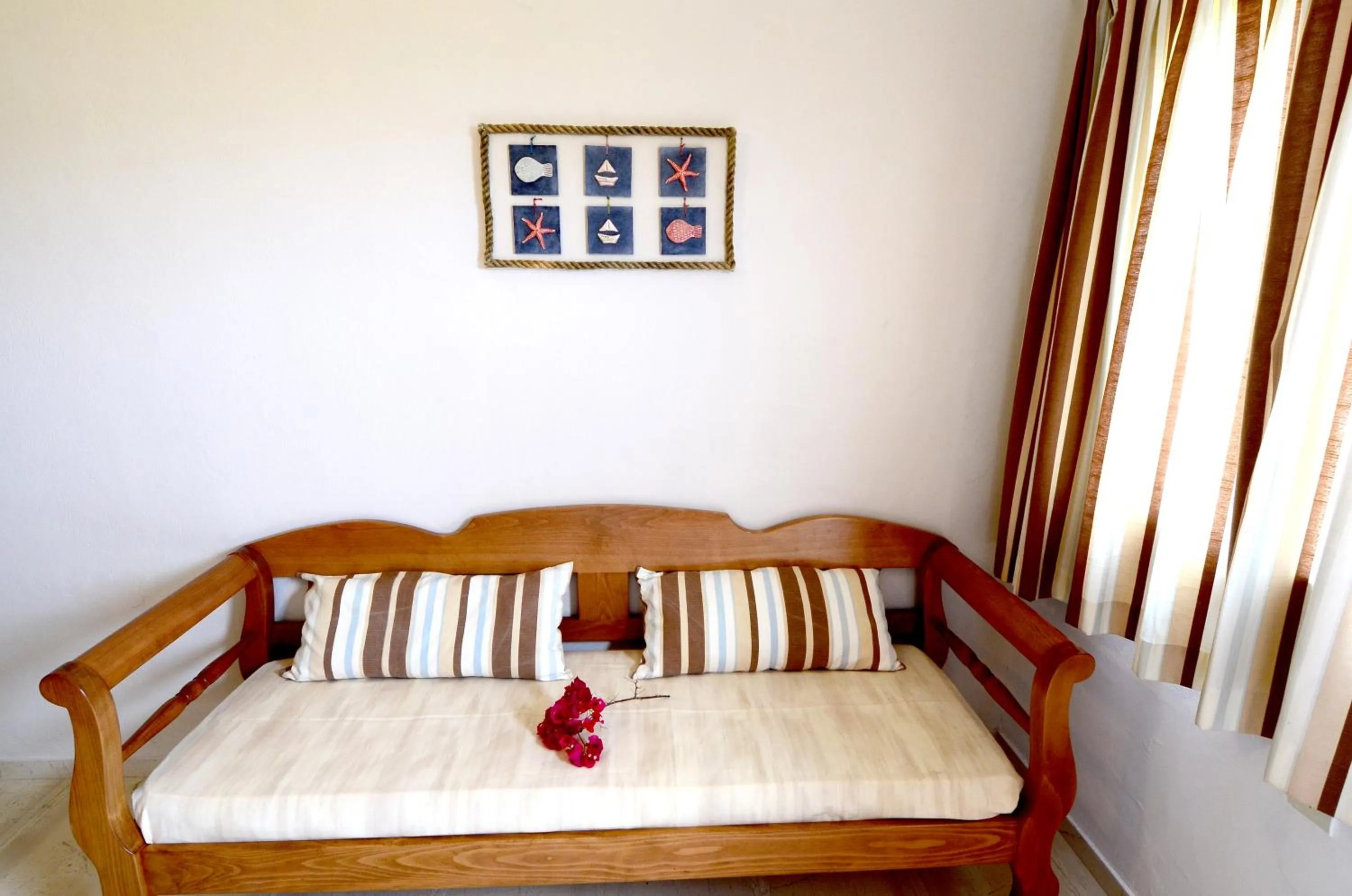 Seating area, Bed in Golden Apartments