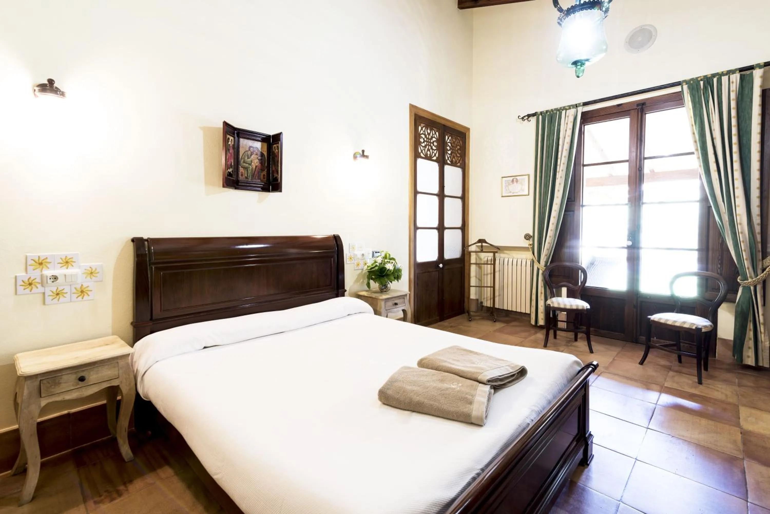 Bed in Aumallia Hotel & Spa