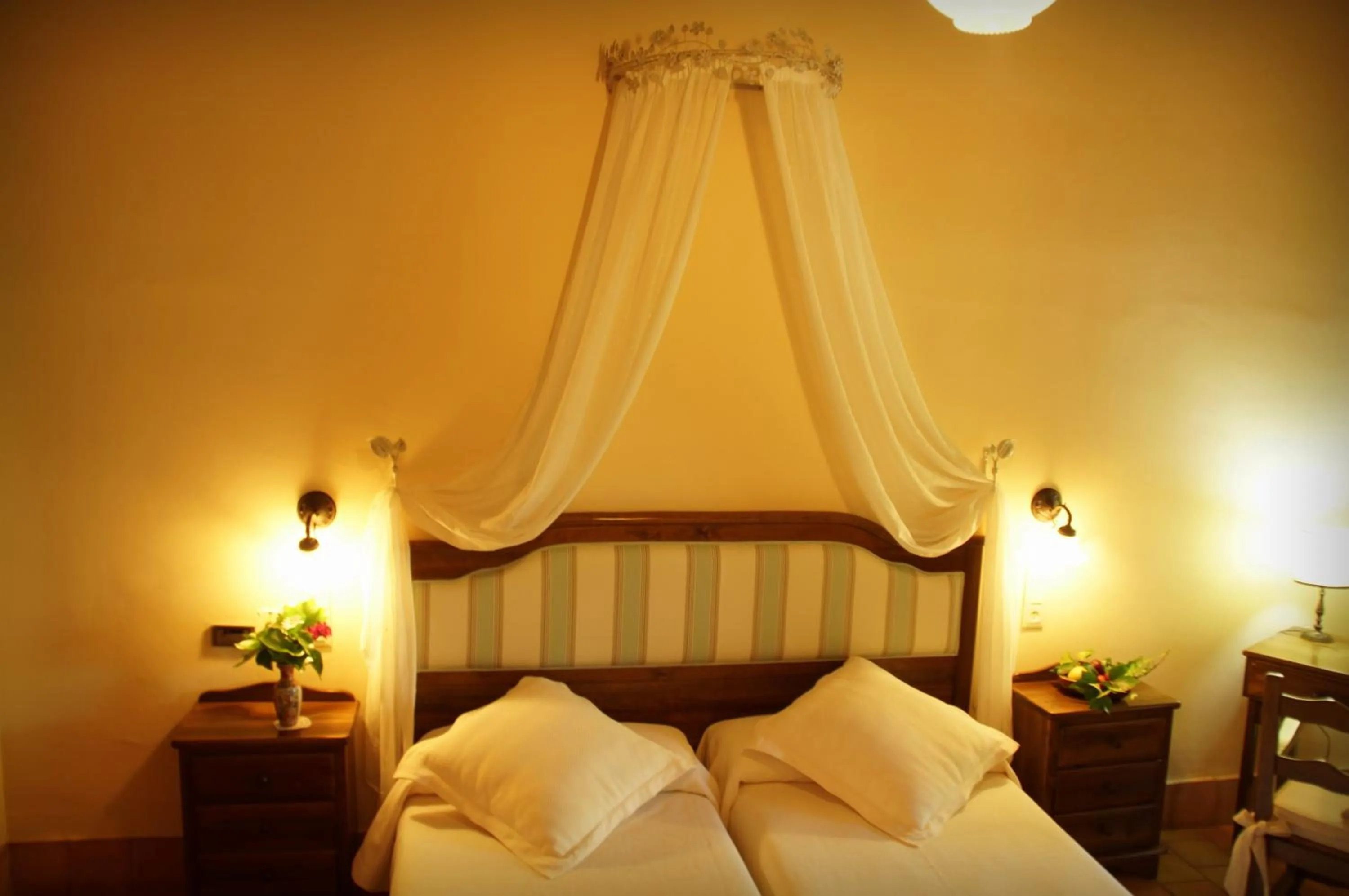 Bed in Aumallia Hotel & Spa