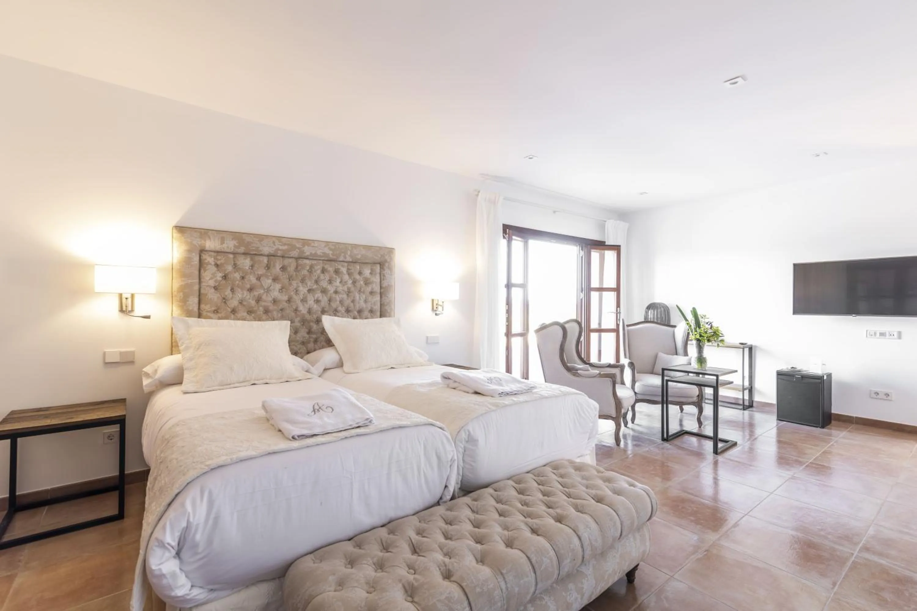 Photo of the whole room, Bed in Aumallia Hotel & Spa