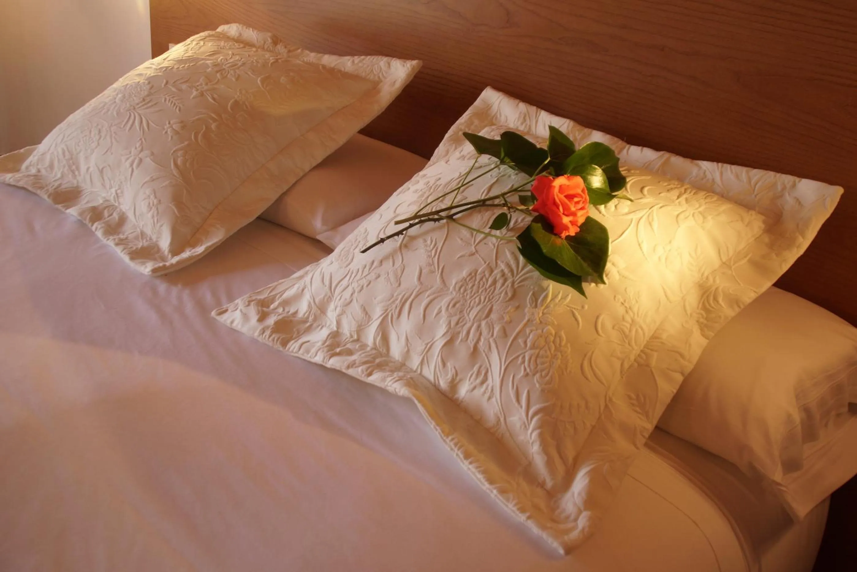 Bed in Aumallia Hotel & Spa