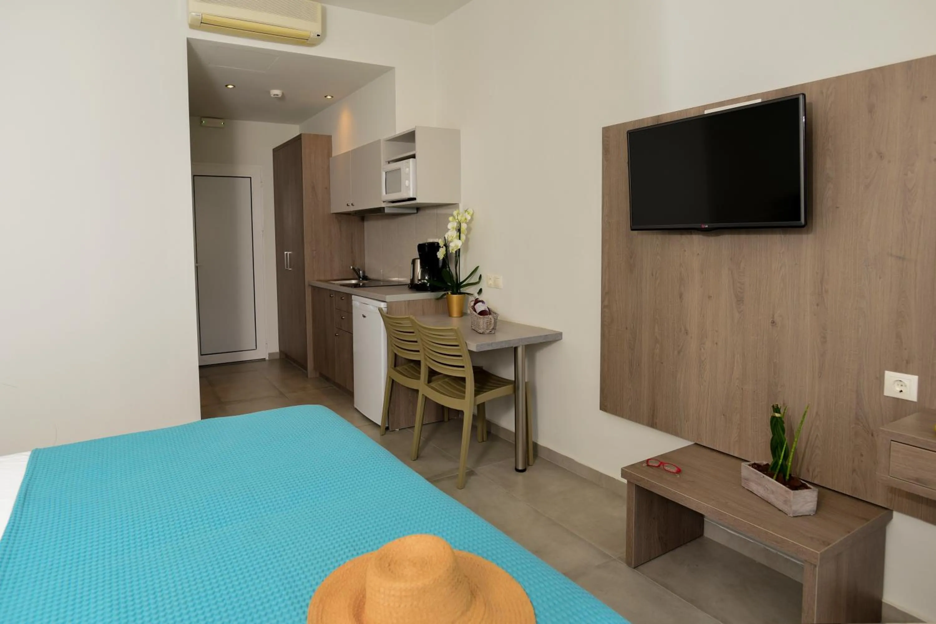 TV and multimedia, Bed in Blue Horizon Apartments