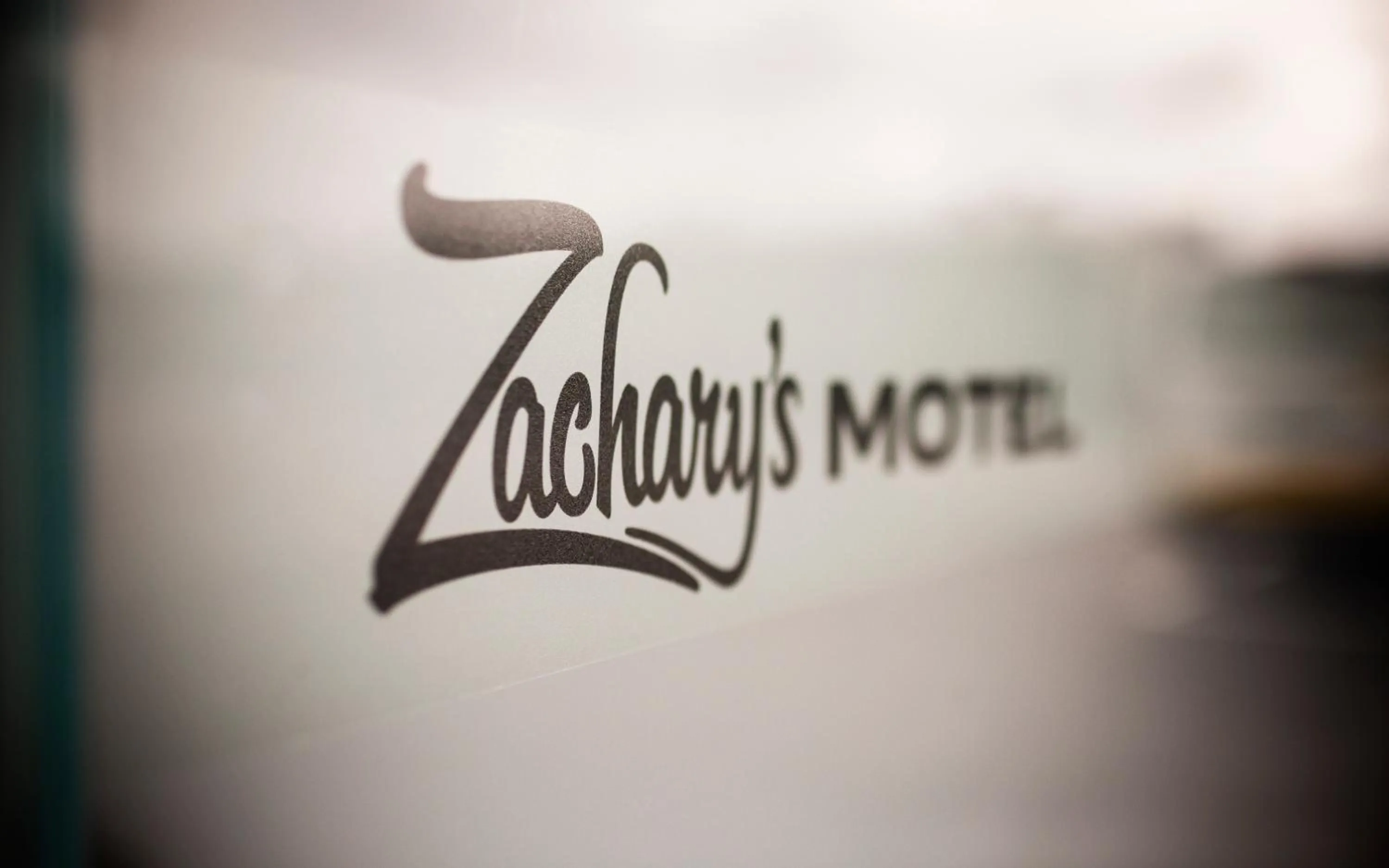 Logo/Certificate/Sign in Zachary's Motel