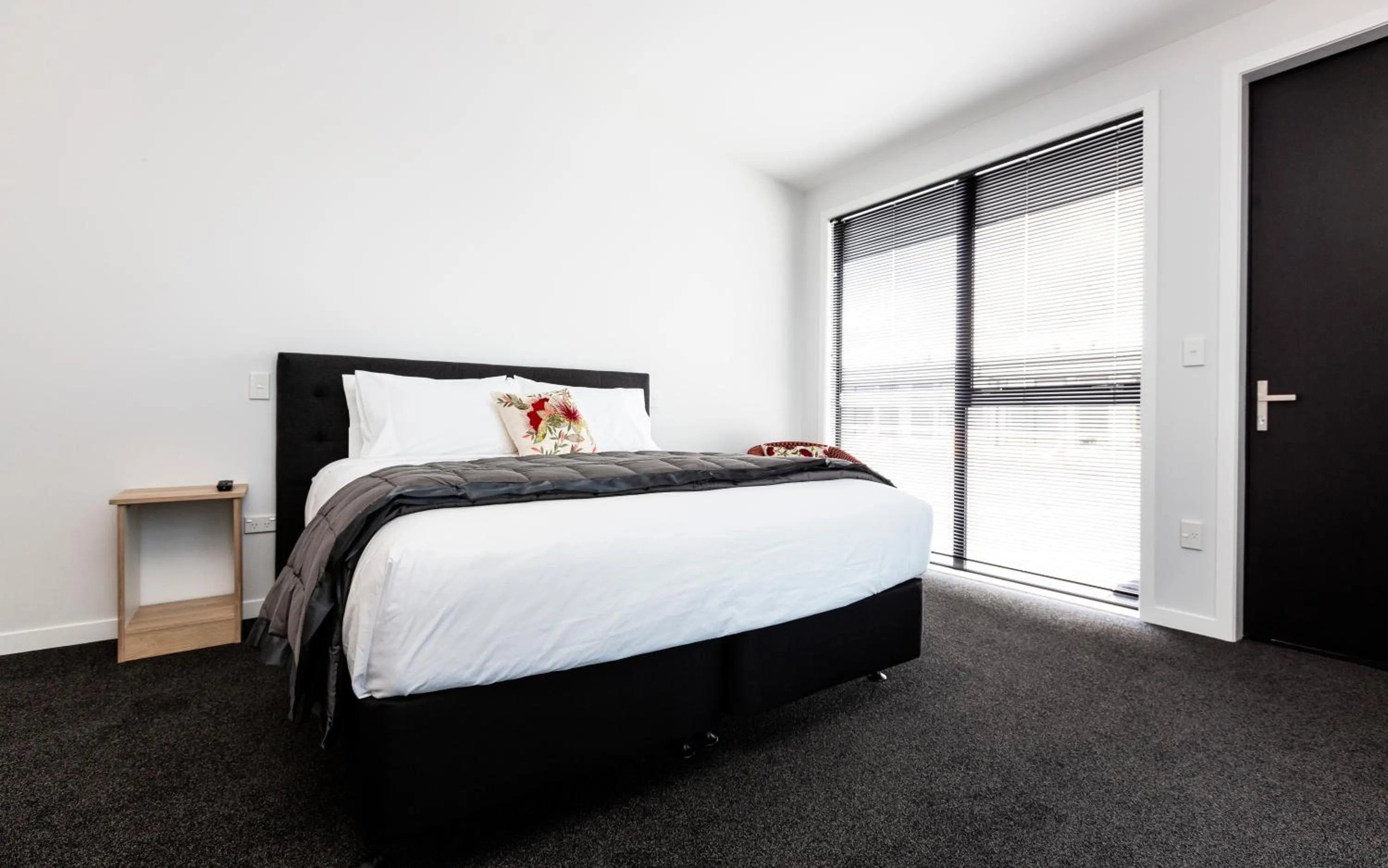 Bed in Zachary's Motel