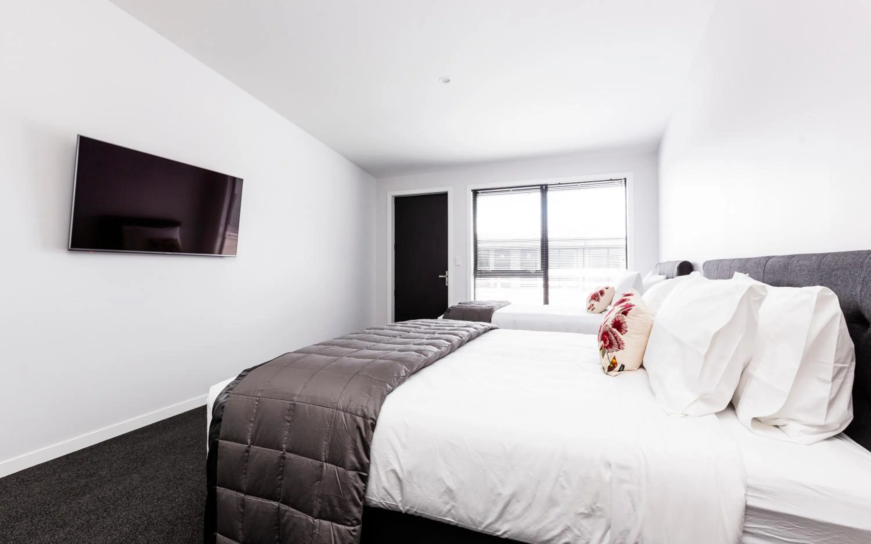 Bed in Zachary's Motel