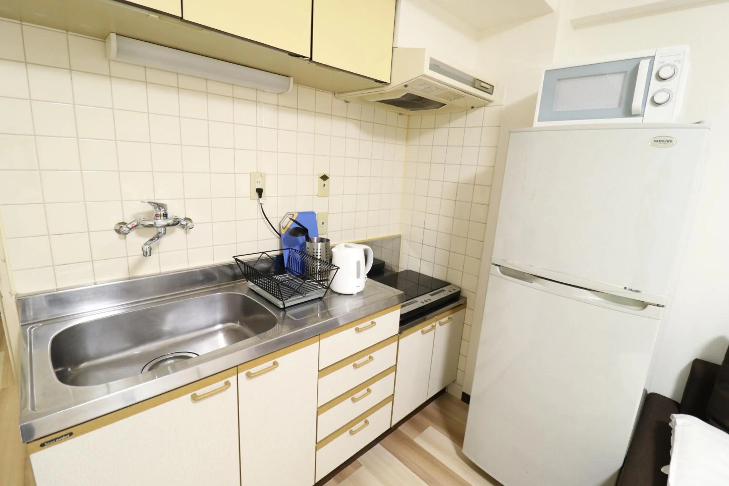 Kitchen or kitchenette in Court Saiwaicho
