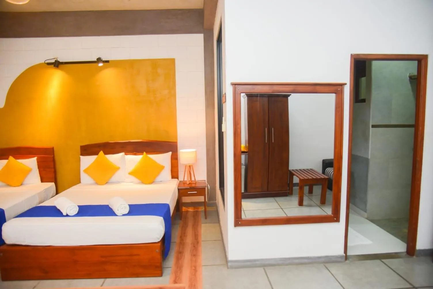 Bed in Royal Tusker Hotel