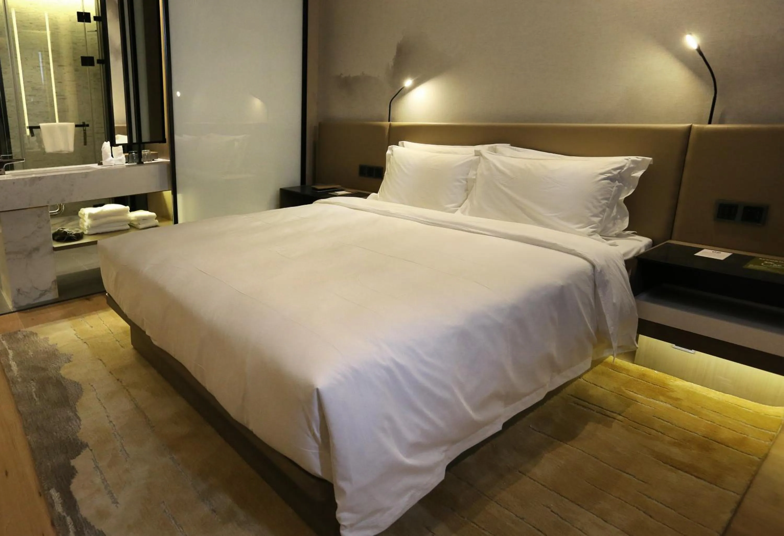 Bed in Novotel Deqing Moganshan