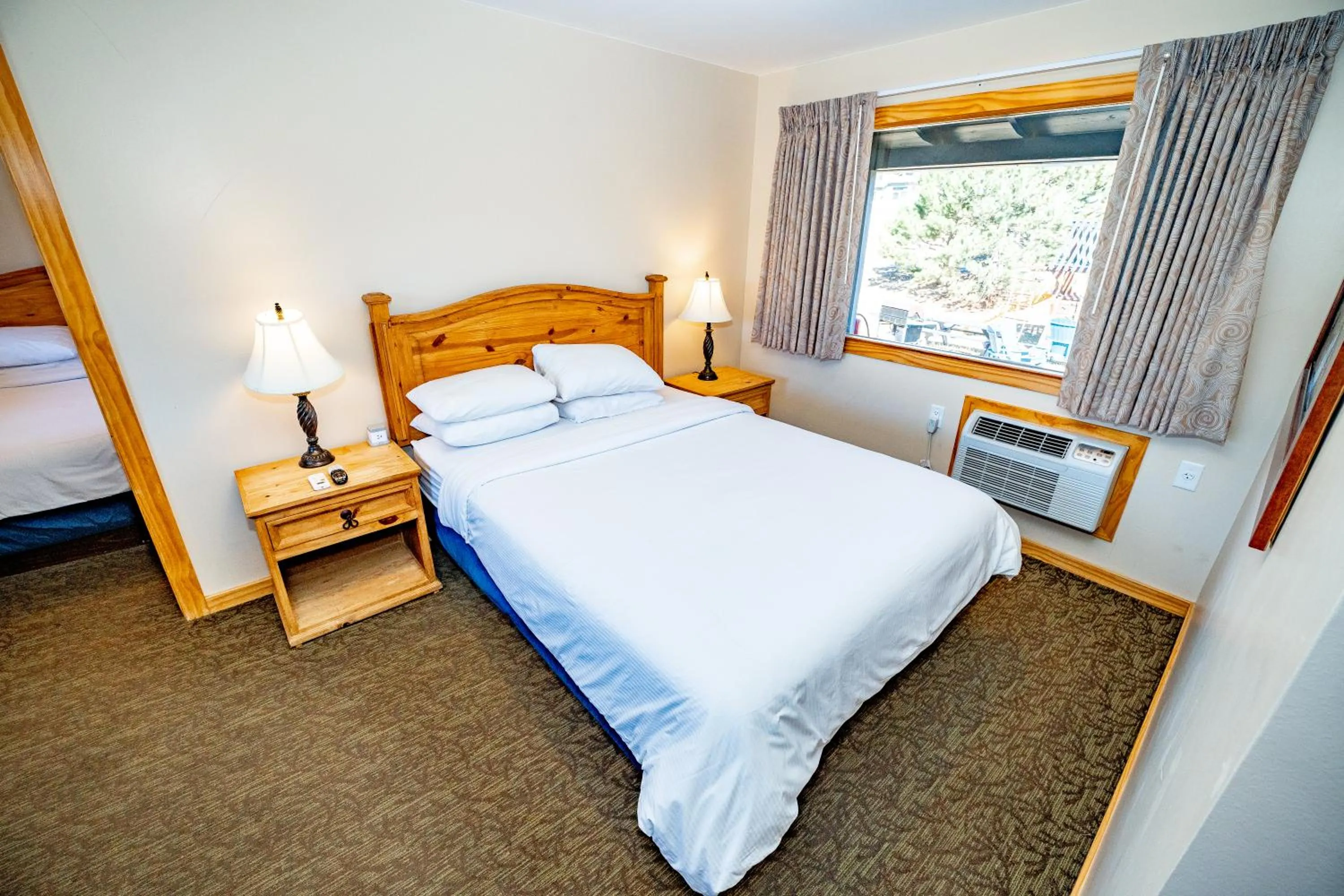 Bed in Coyote Mountain Lodge