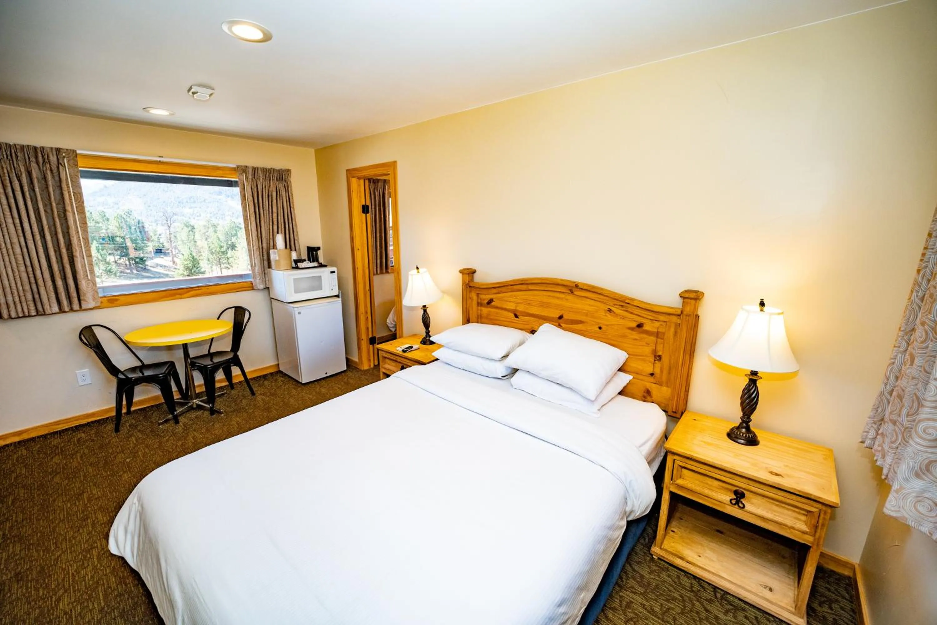 Bed in Coyote Mountain Lodge