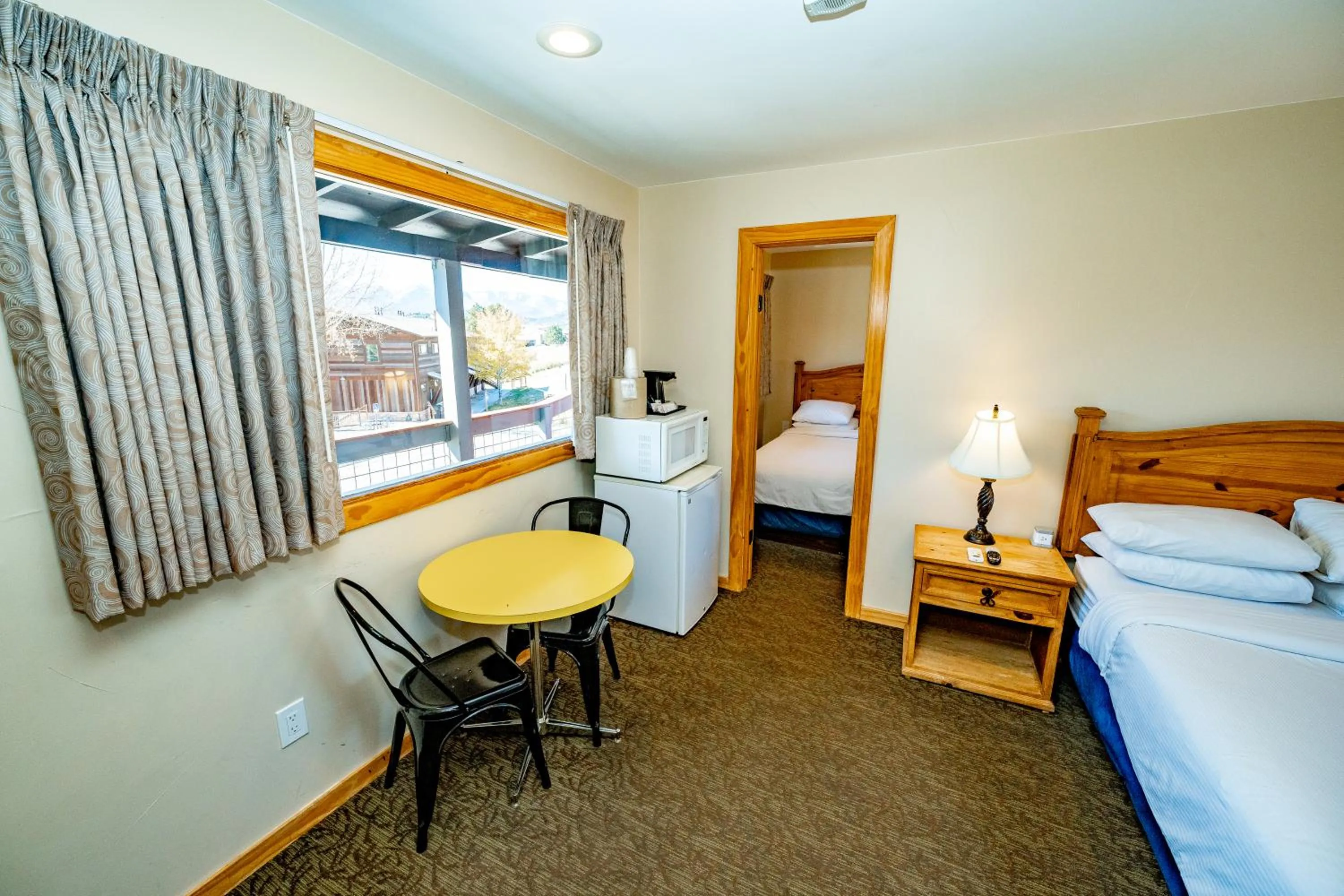 Bed in Coyote Mountain Lodge