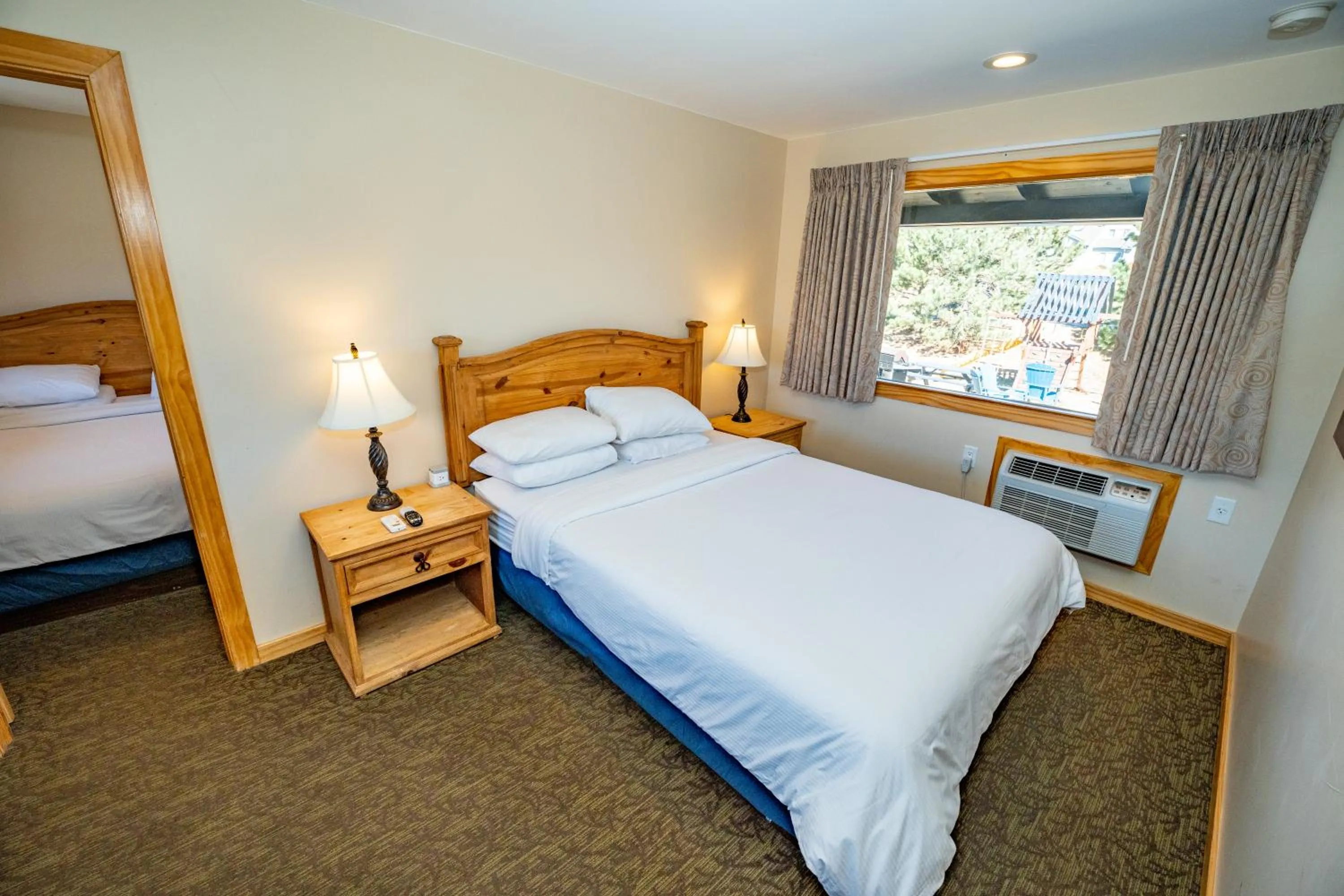 Bed in Coyote Mountain Lodge