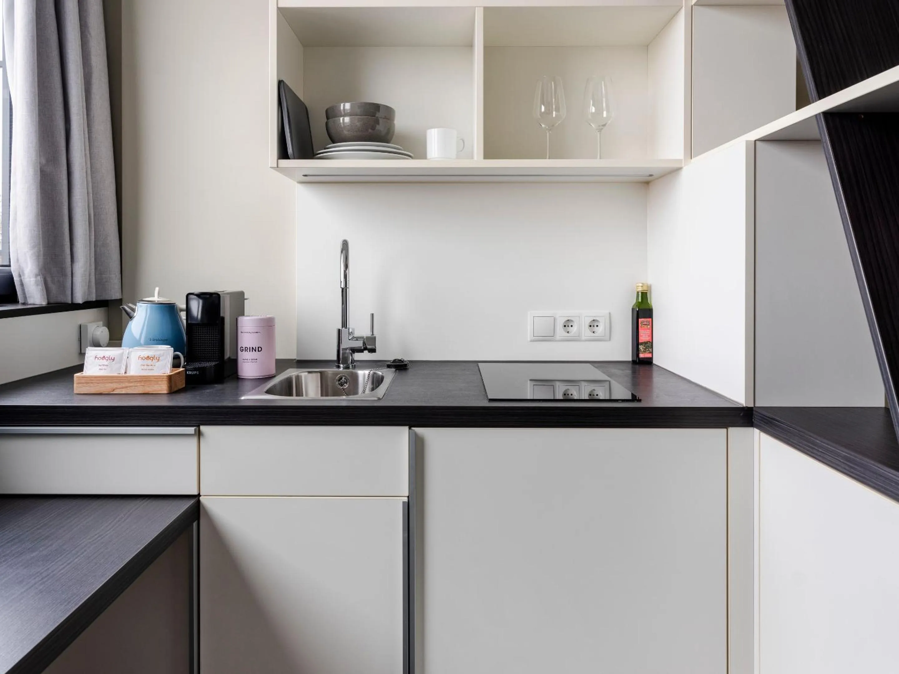 Kitchen or kitchenette in numa I Viktoria Apartments