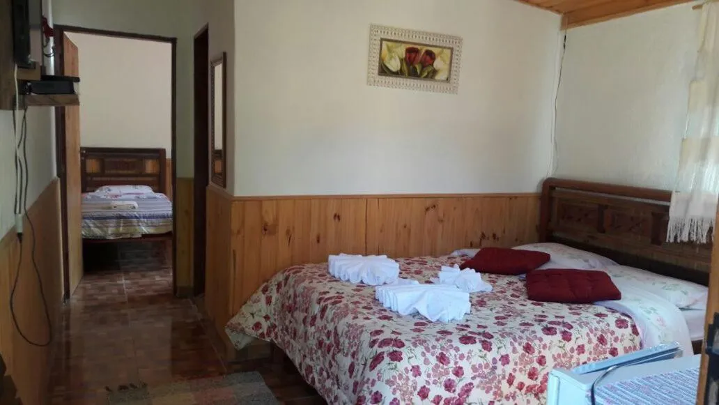Bed in Pousada Vale da Represa