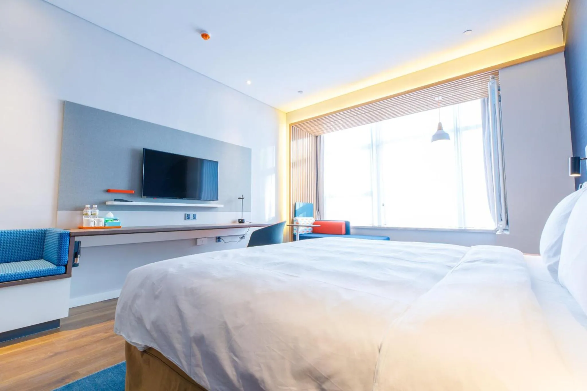 Photo of the whole room, Bed in Holiday Inn Express Harbin Qunli by IHG