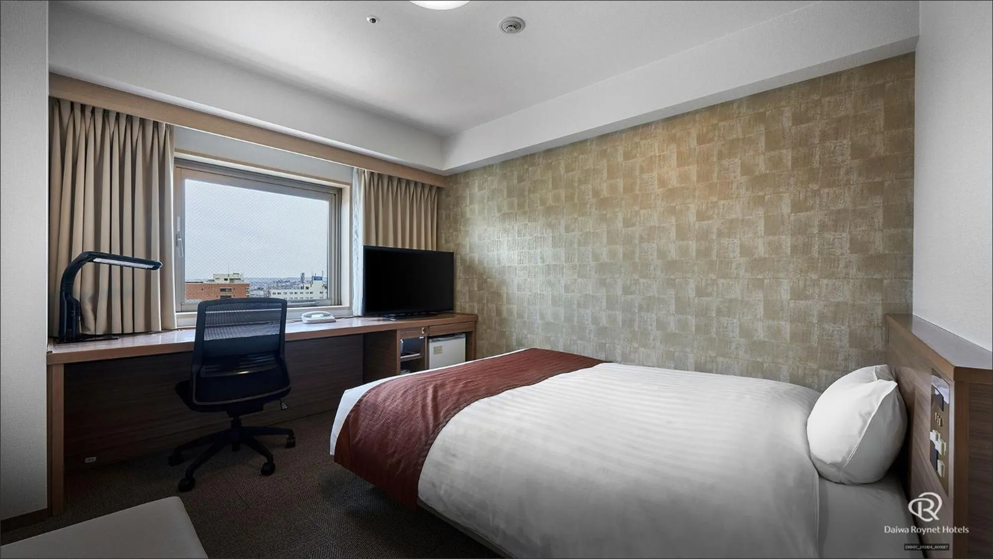 Bed in Daiwa Roynet Hotel Hachinohe