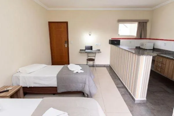 Bed in Colonial Flat Hotel