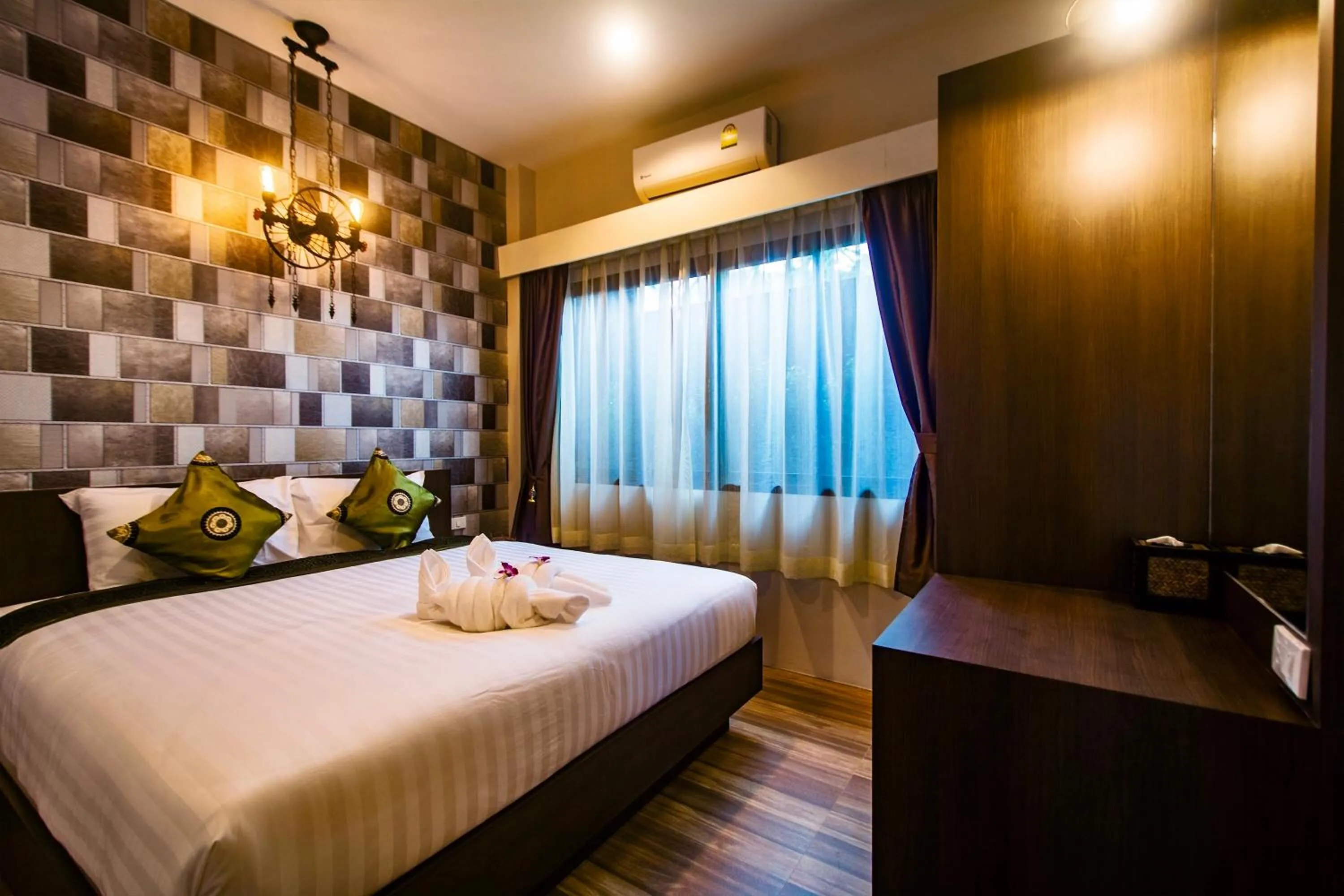 Bed in KG Private Pool Villas Soi 9