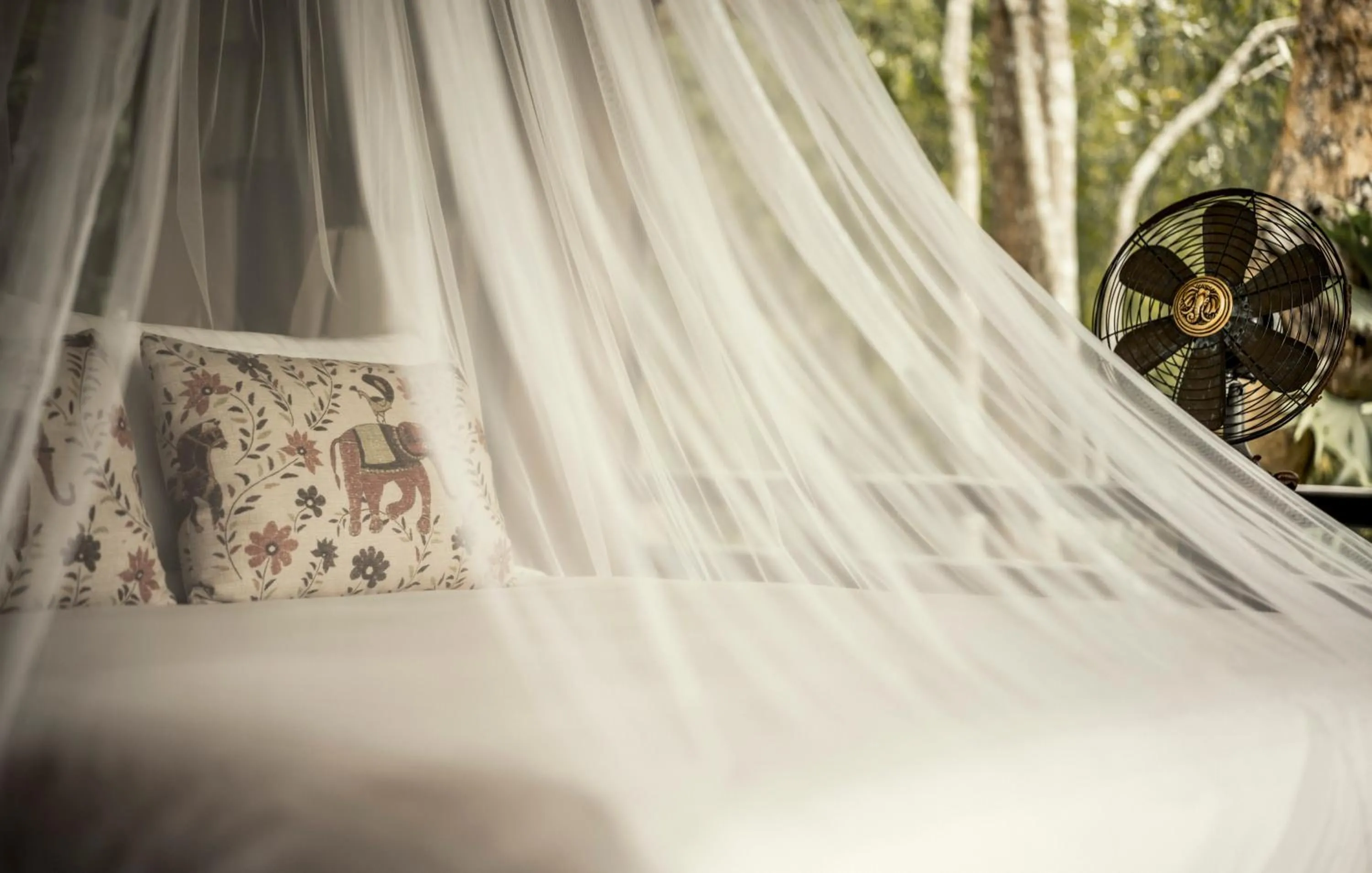 Bed in Four Seasons Tented Camp Golden Triangle