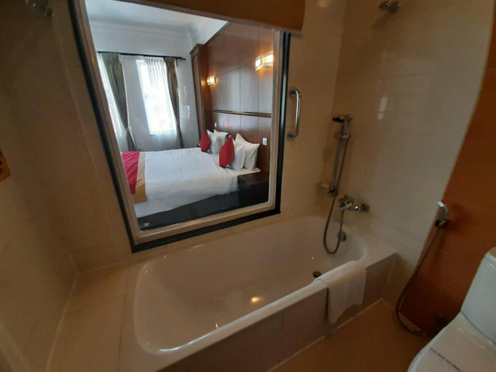 Bathroom, Bed in Waterfront Resort by KGH Group