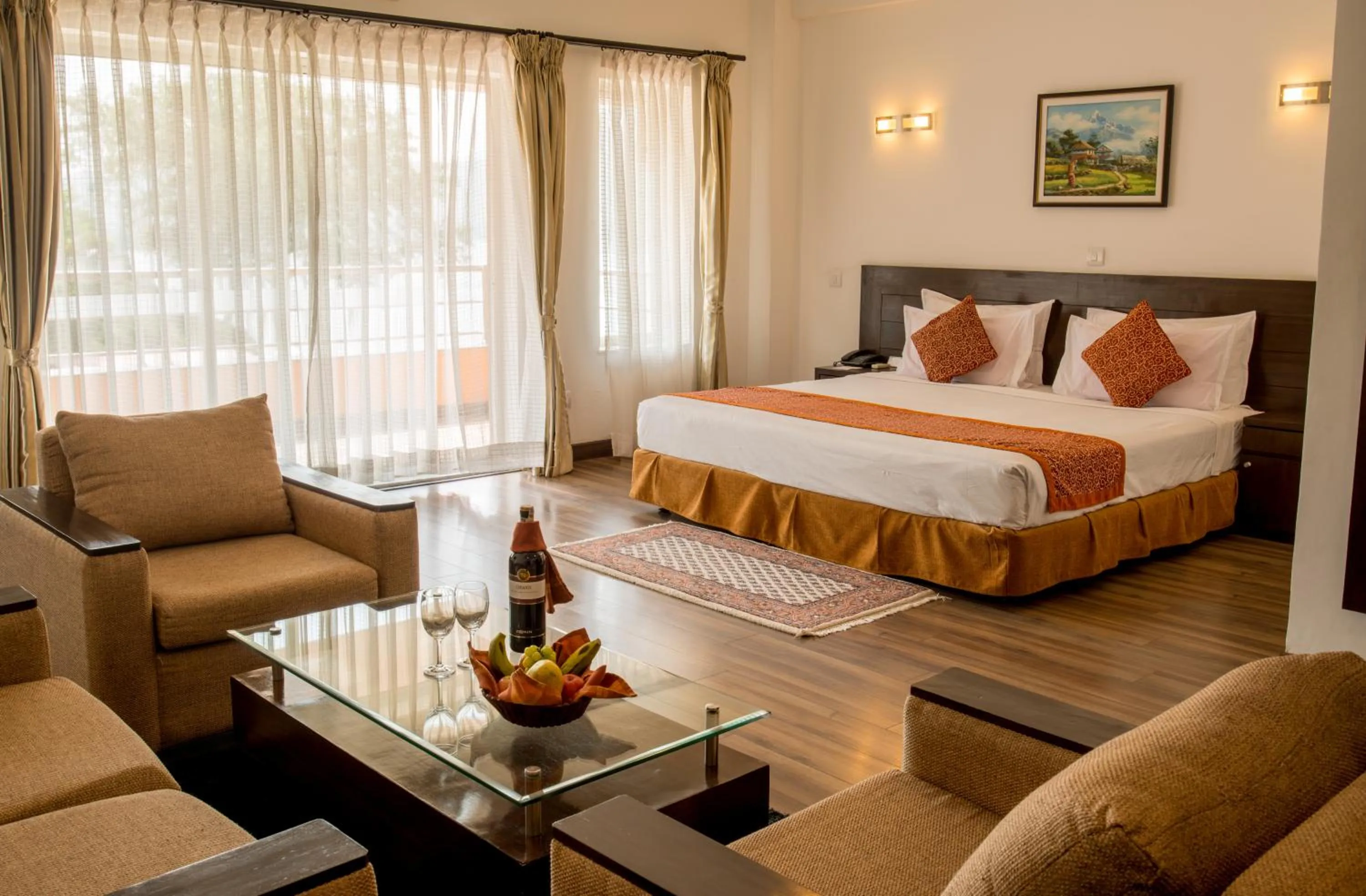 Seating area, Bed in Waterfront Resort by KGH Group