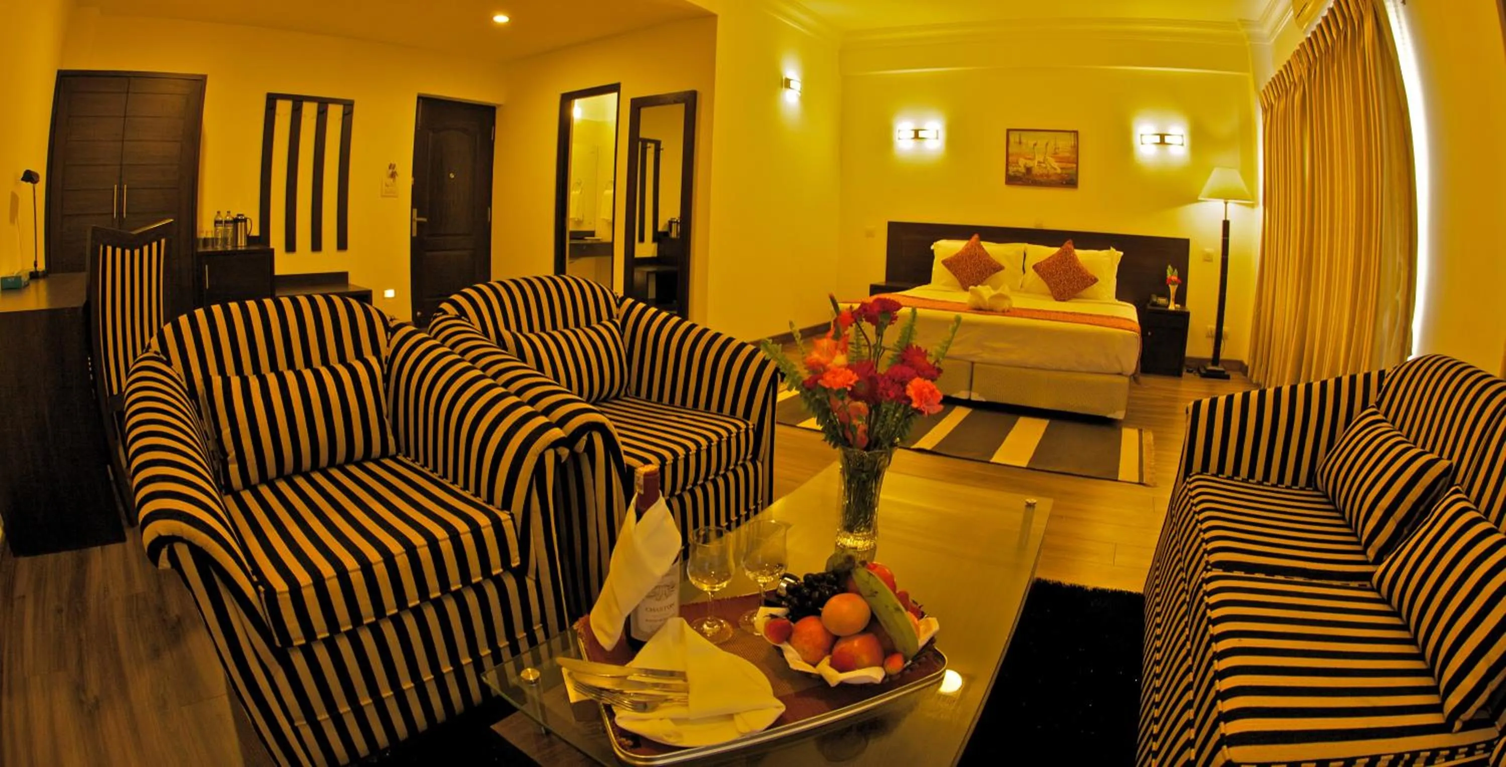 Seating area in Waterfront Resort by KGH Group