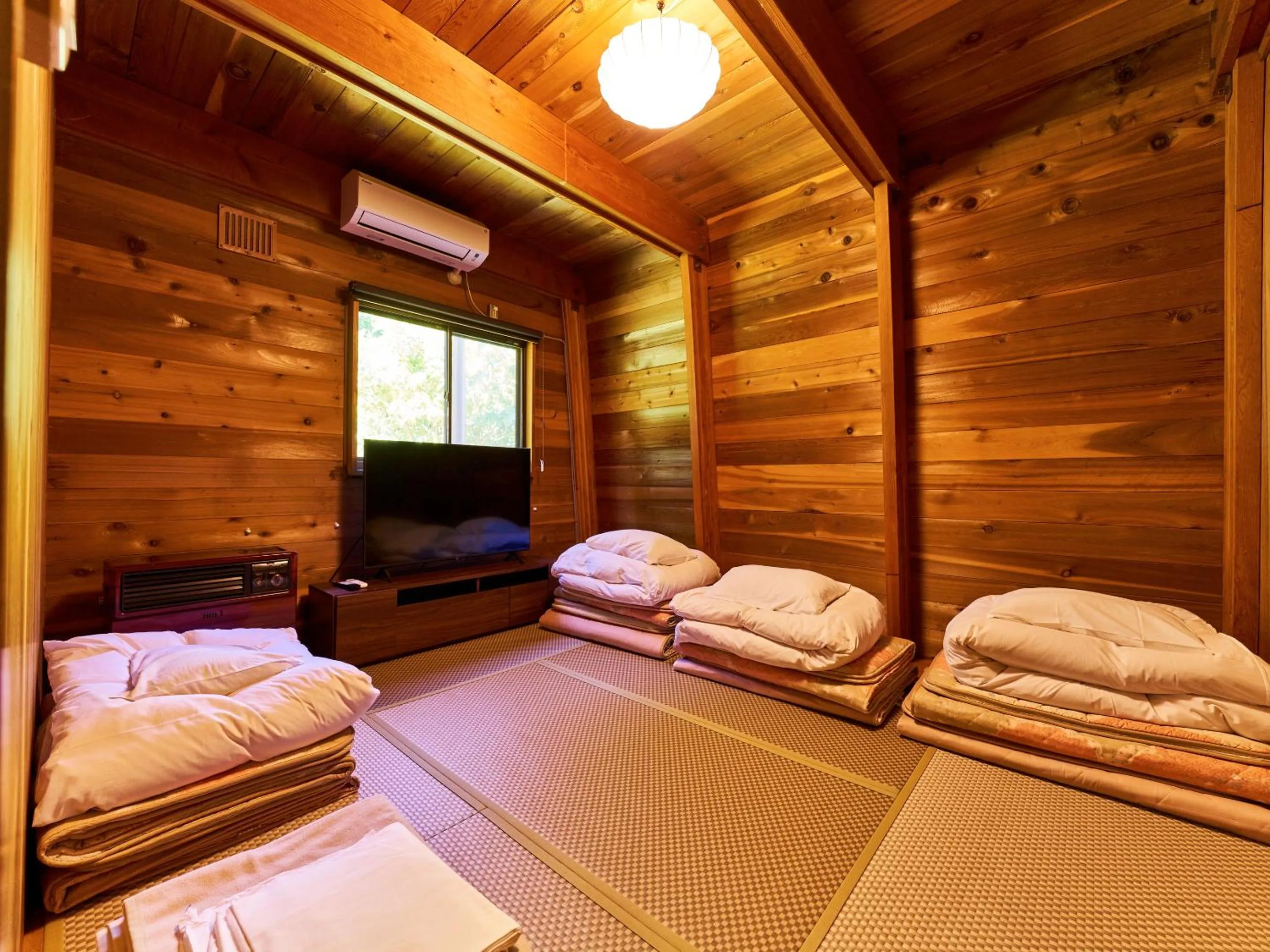 Bed in LiVEMAX RESORT Hakodate Greenpia Onuma