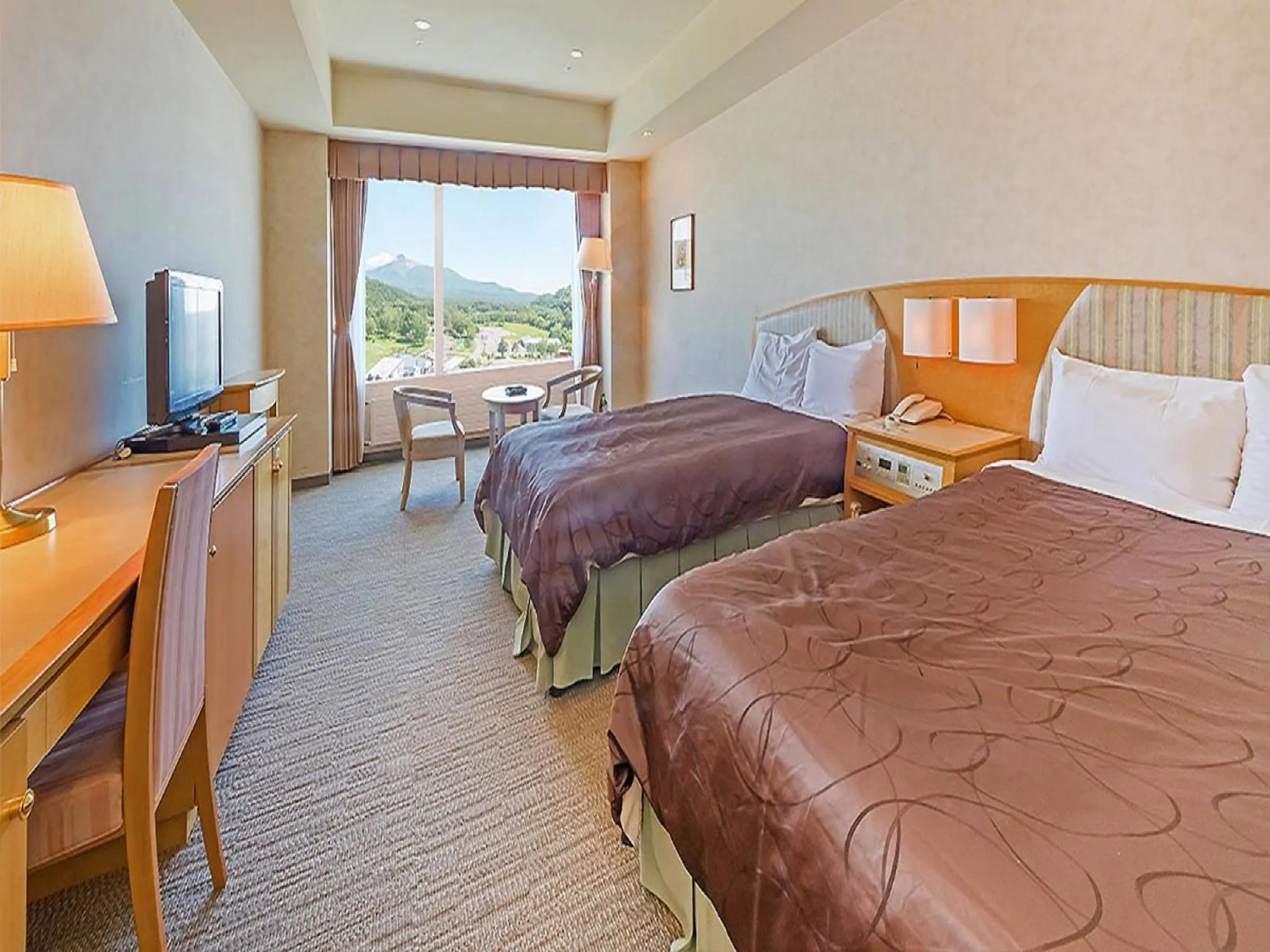 Bed in LiVEMAX RESORT Hakodate Greenpia Onuma