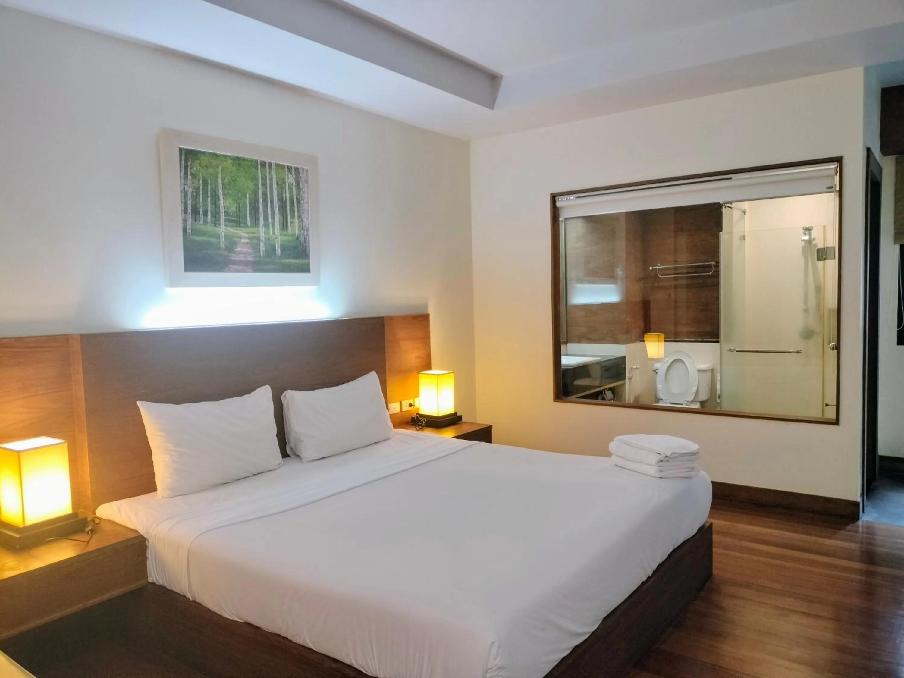 Bed in Baan Saikao Plaza Hotel & Service Apartment
