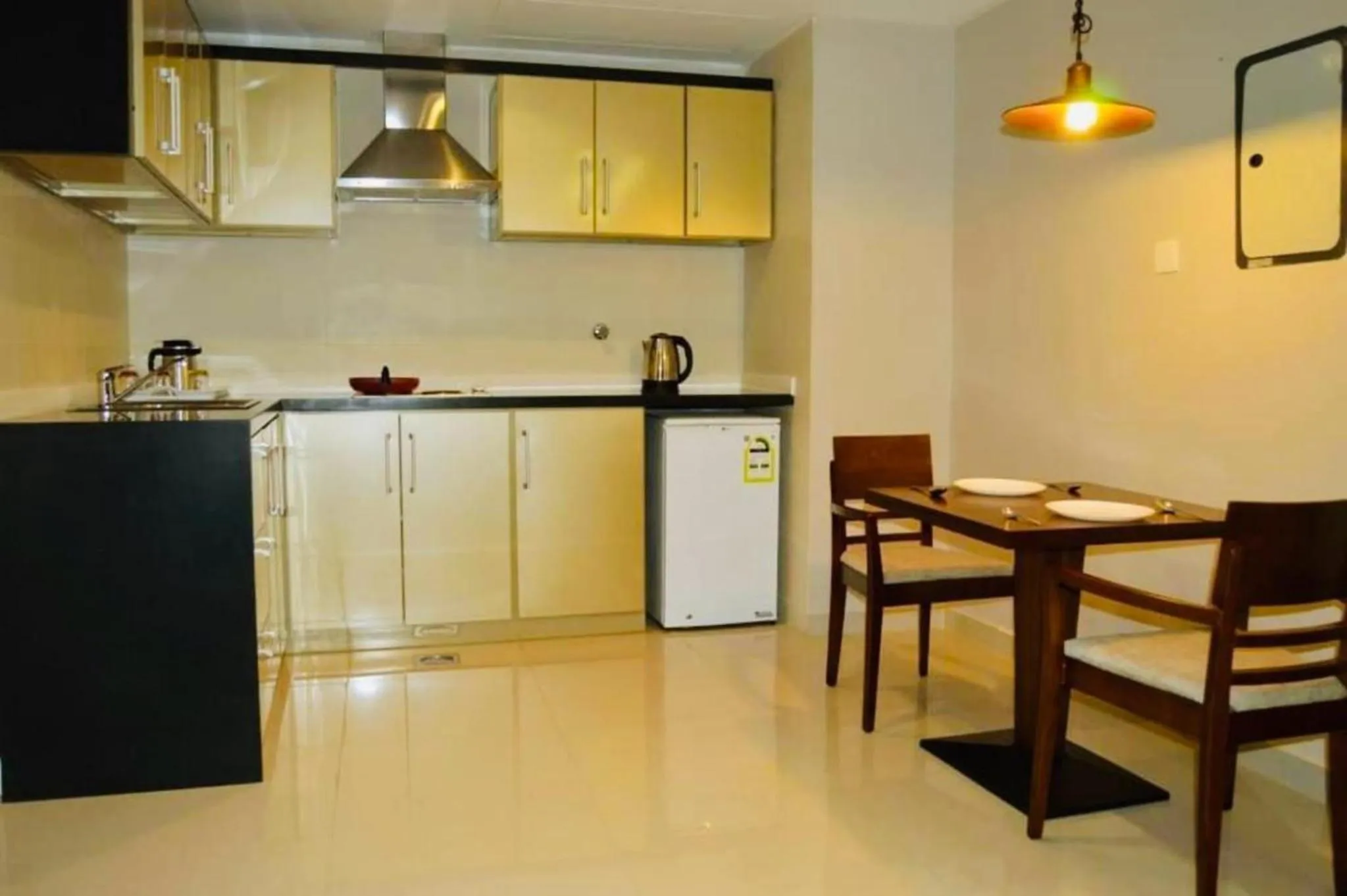 Kitchen or kitchenette in Yara Suites