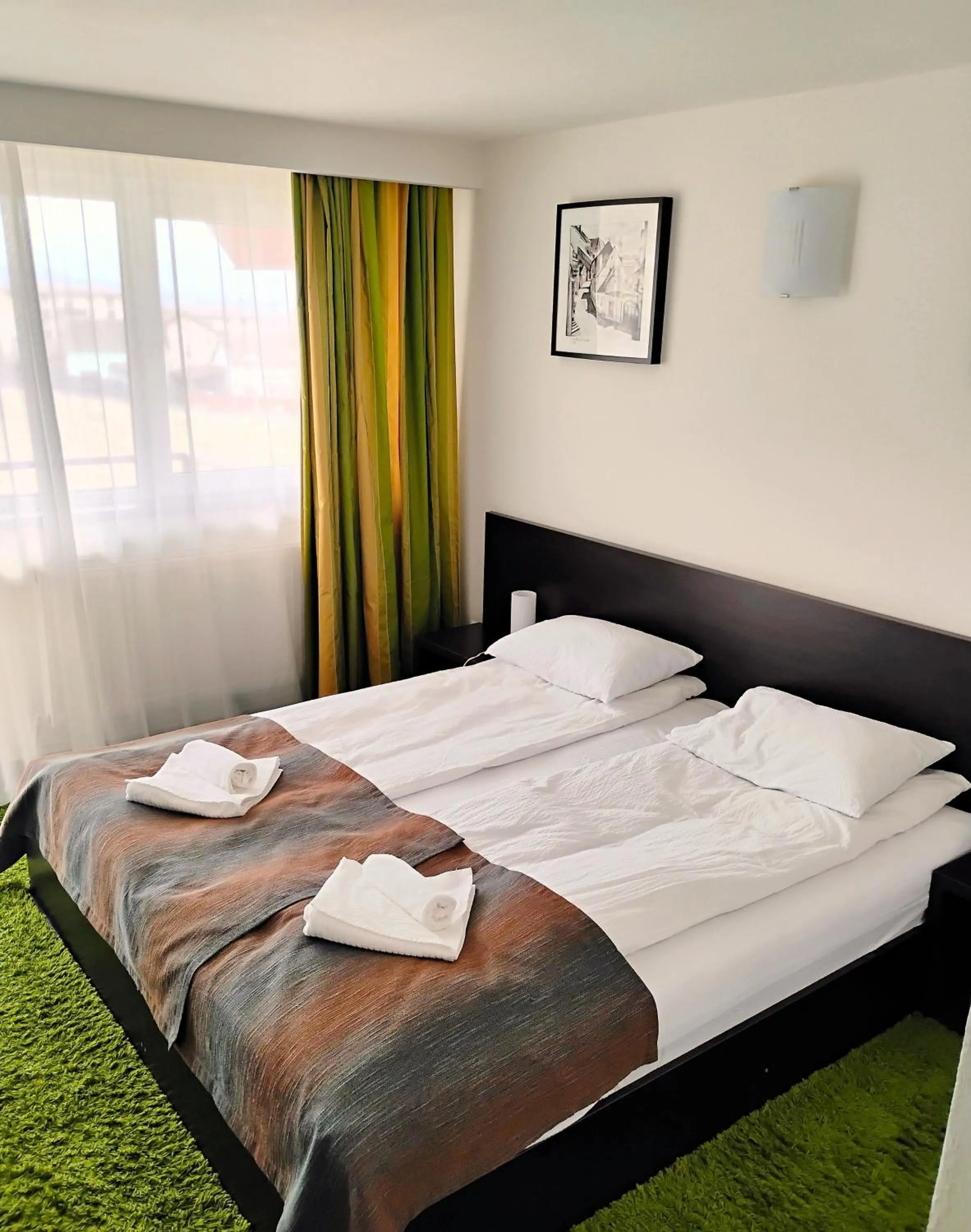 Bed in Pensiunea Carmen - Bikers Friendly Nest