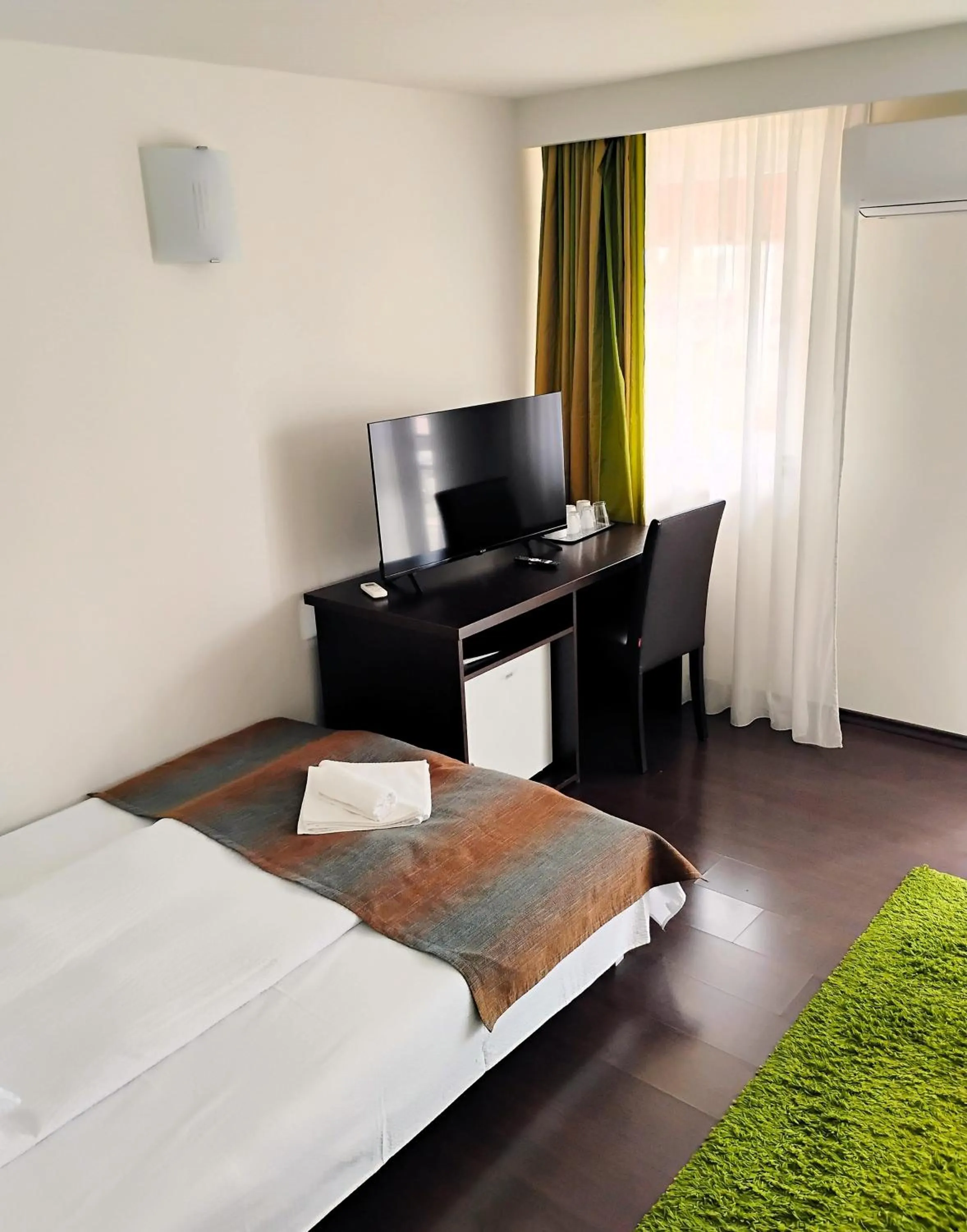 Bed in Pensiunea Carmen - Bikers Friendly Nest