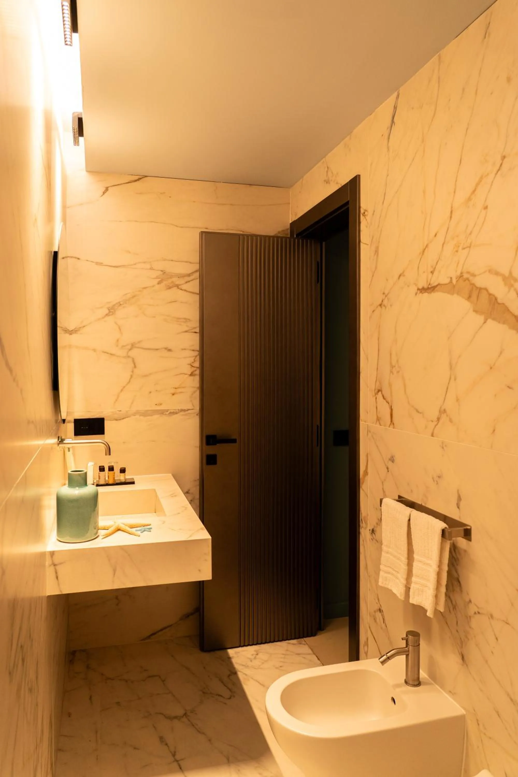 Toilet in Relais sul Mare Boutique Hotel